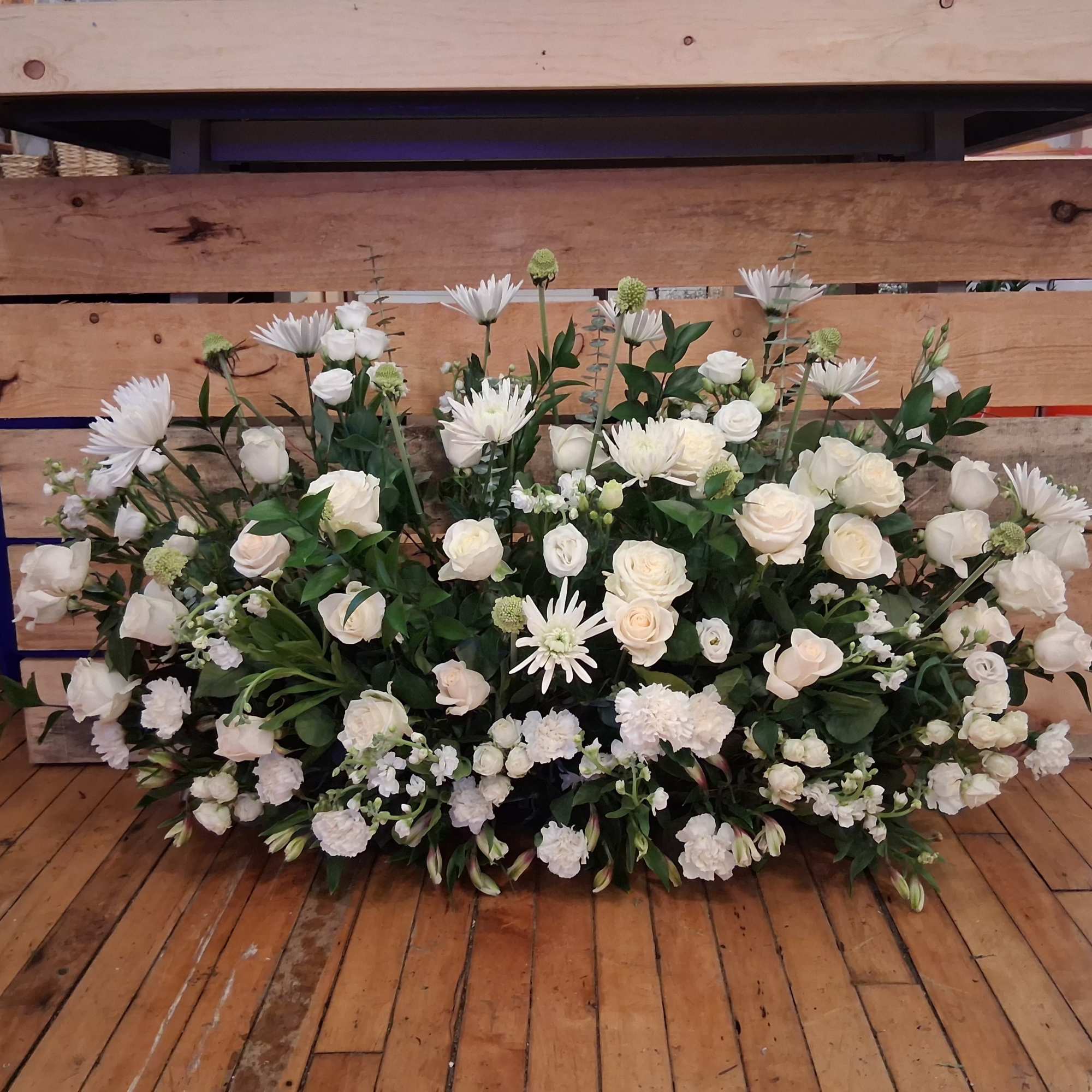 Beautiful garden style under table sweetheart table centerpiece of white roses, carnations