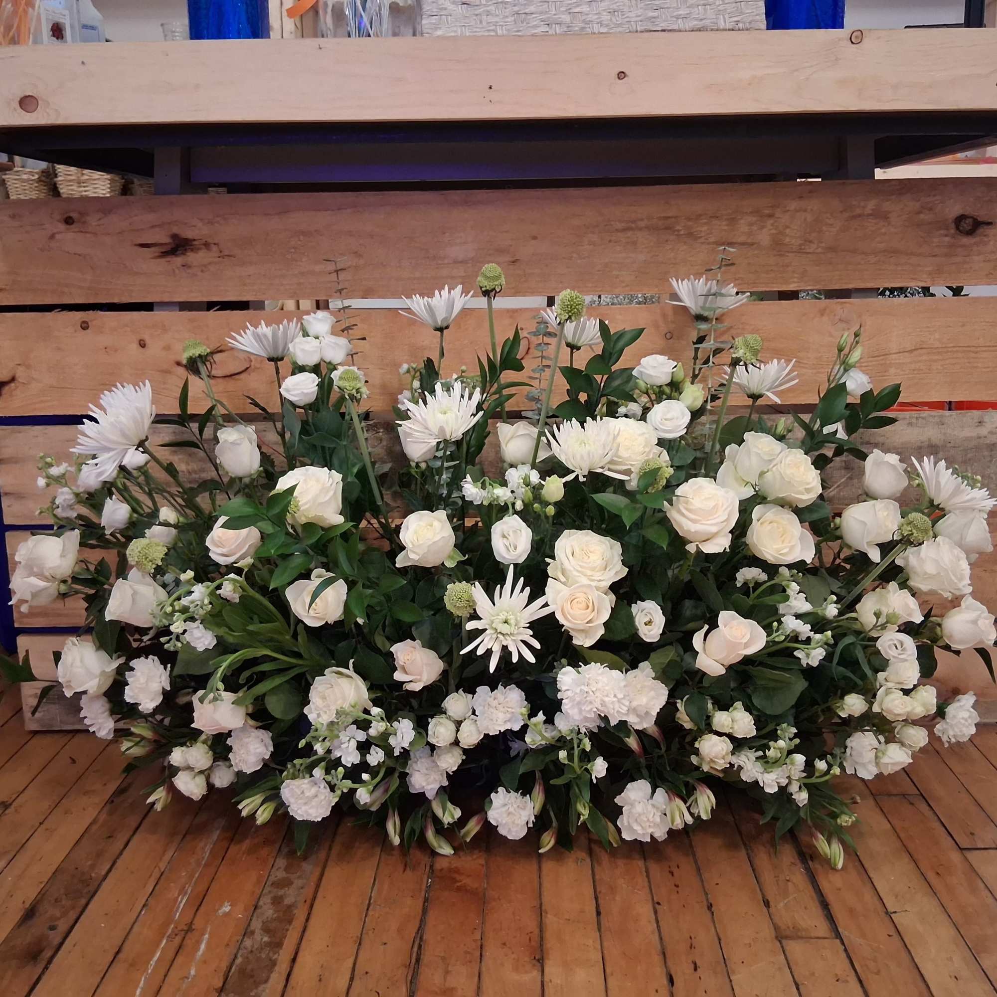 Beautiful garden style under table sweetheart table centerpiece of white roses, carnations