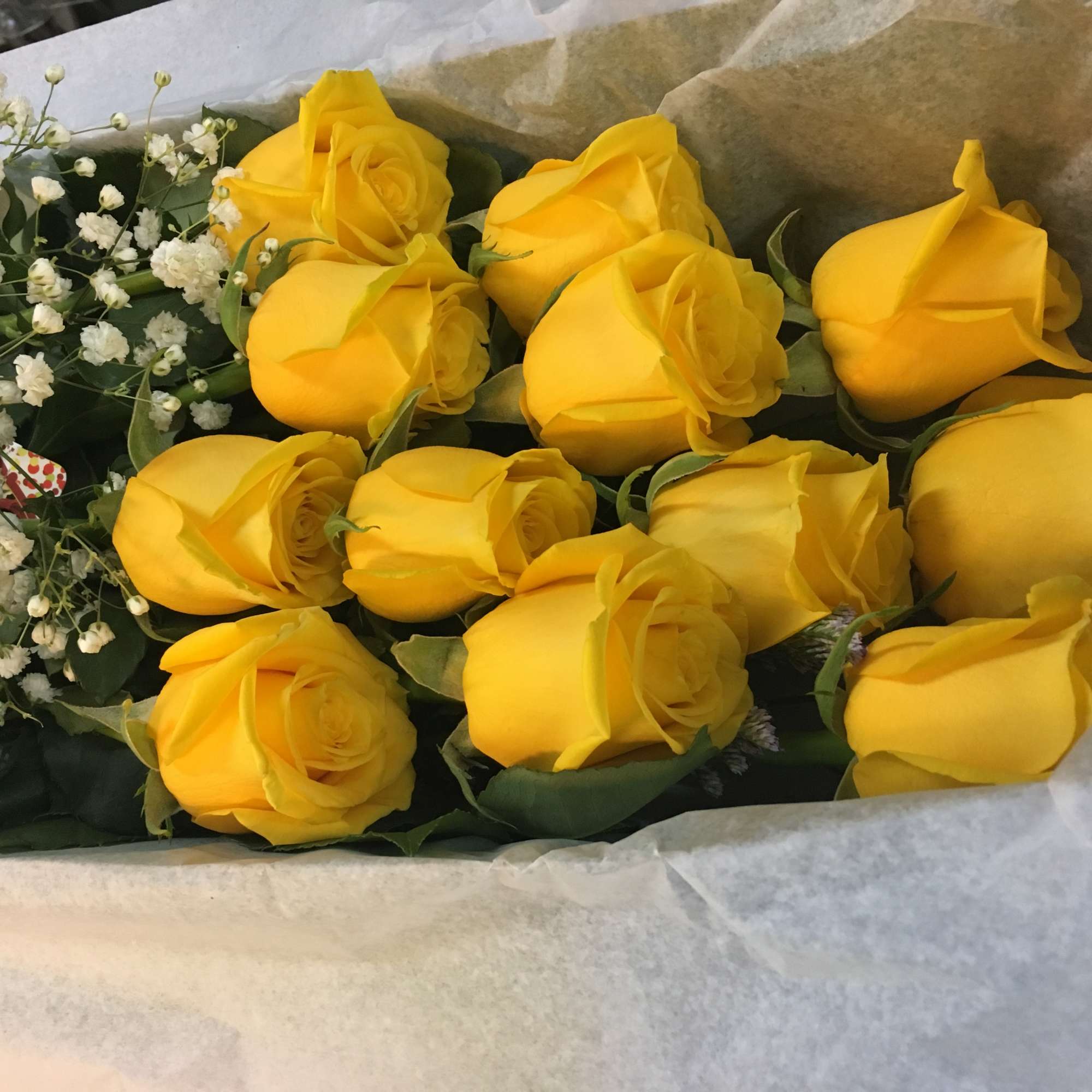 Long Stem Roses.  One Dozen Roses Boxed ,Fancy Greens.

CALL US IF