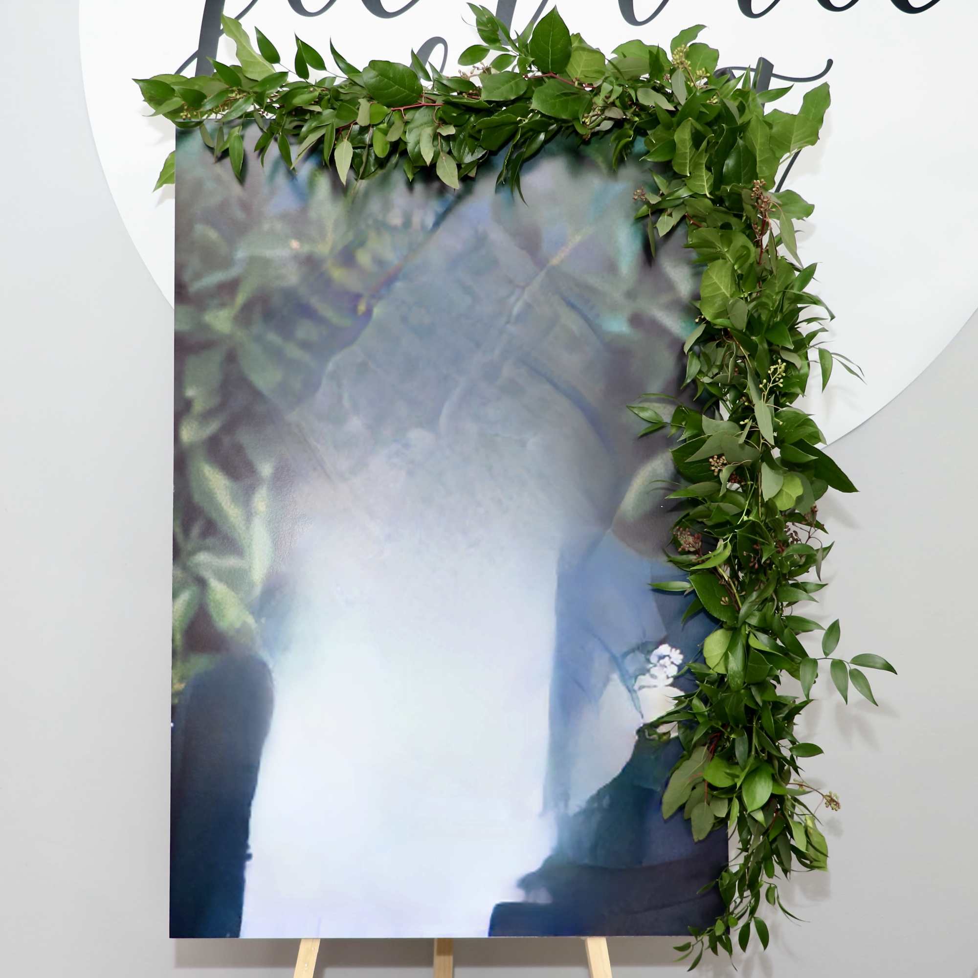 We provide the garland, you provide the poster board of your loved
