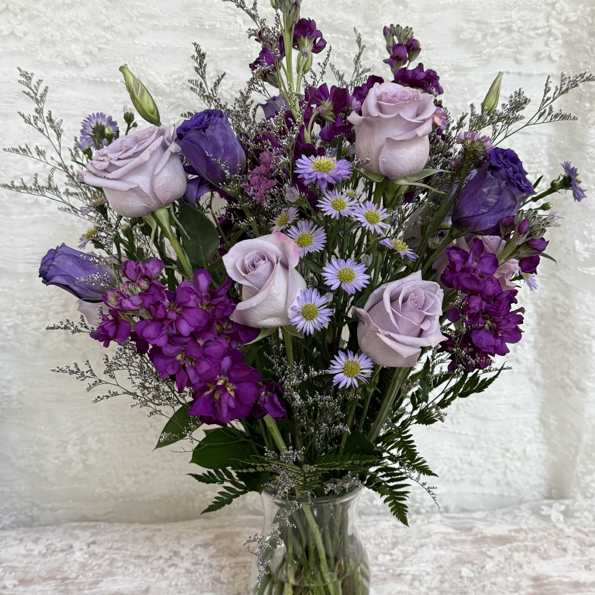 Purple bloom arrangement 
Perfect for a birthday, anniversary or get well. 
