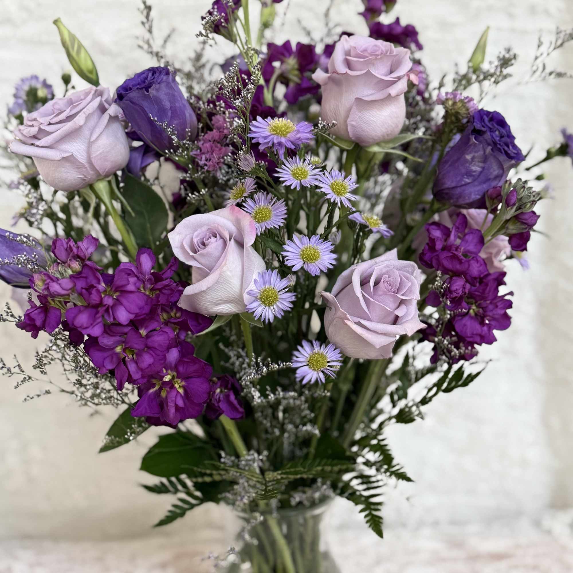 Purple bloom arrangement 
Perfect for a birthday, anniversary or get well. 