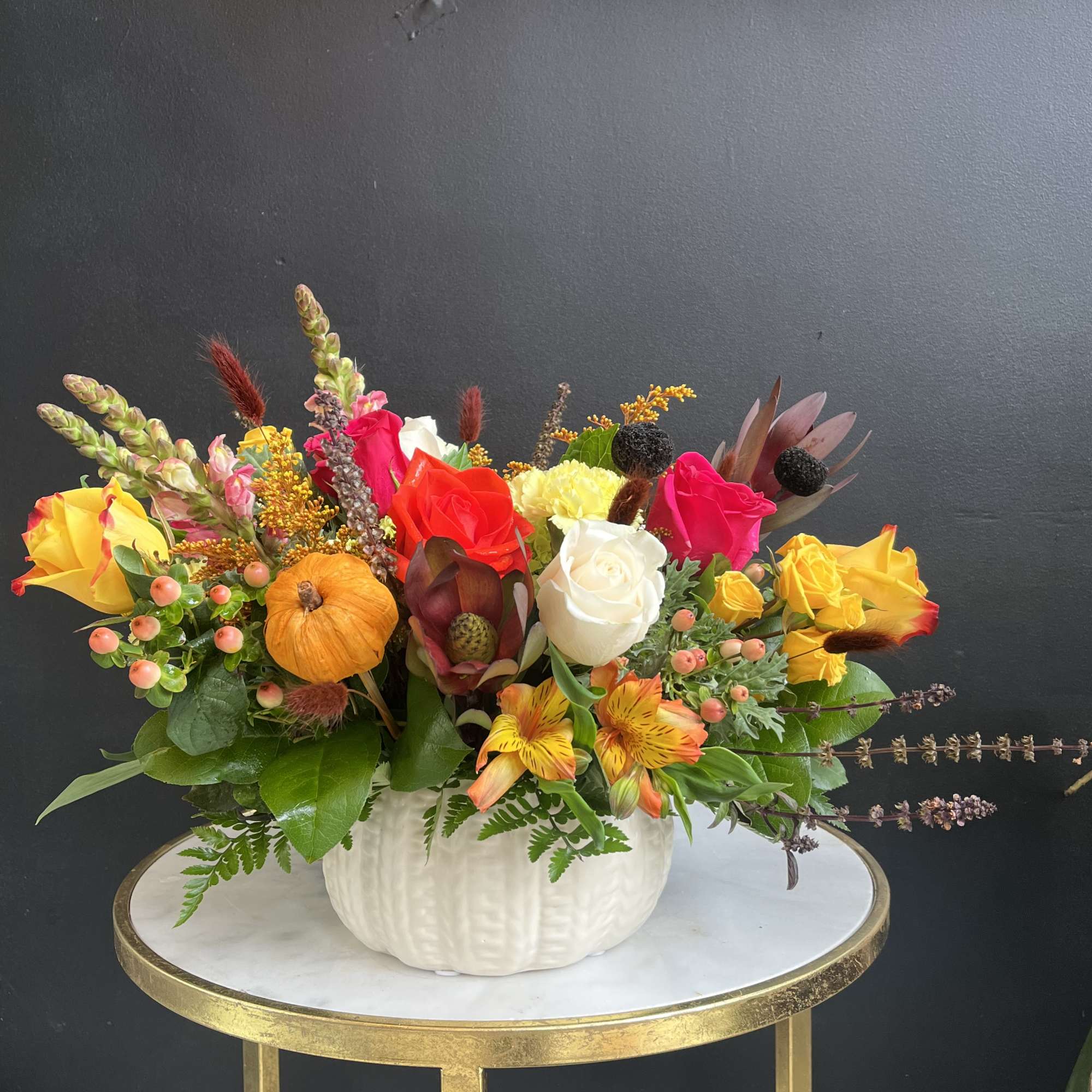 Fall assortment of Sunflowers, Leucadendron, Mums, Waxflower, Spray Roses and Assorted Greenery