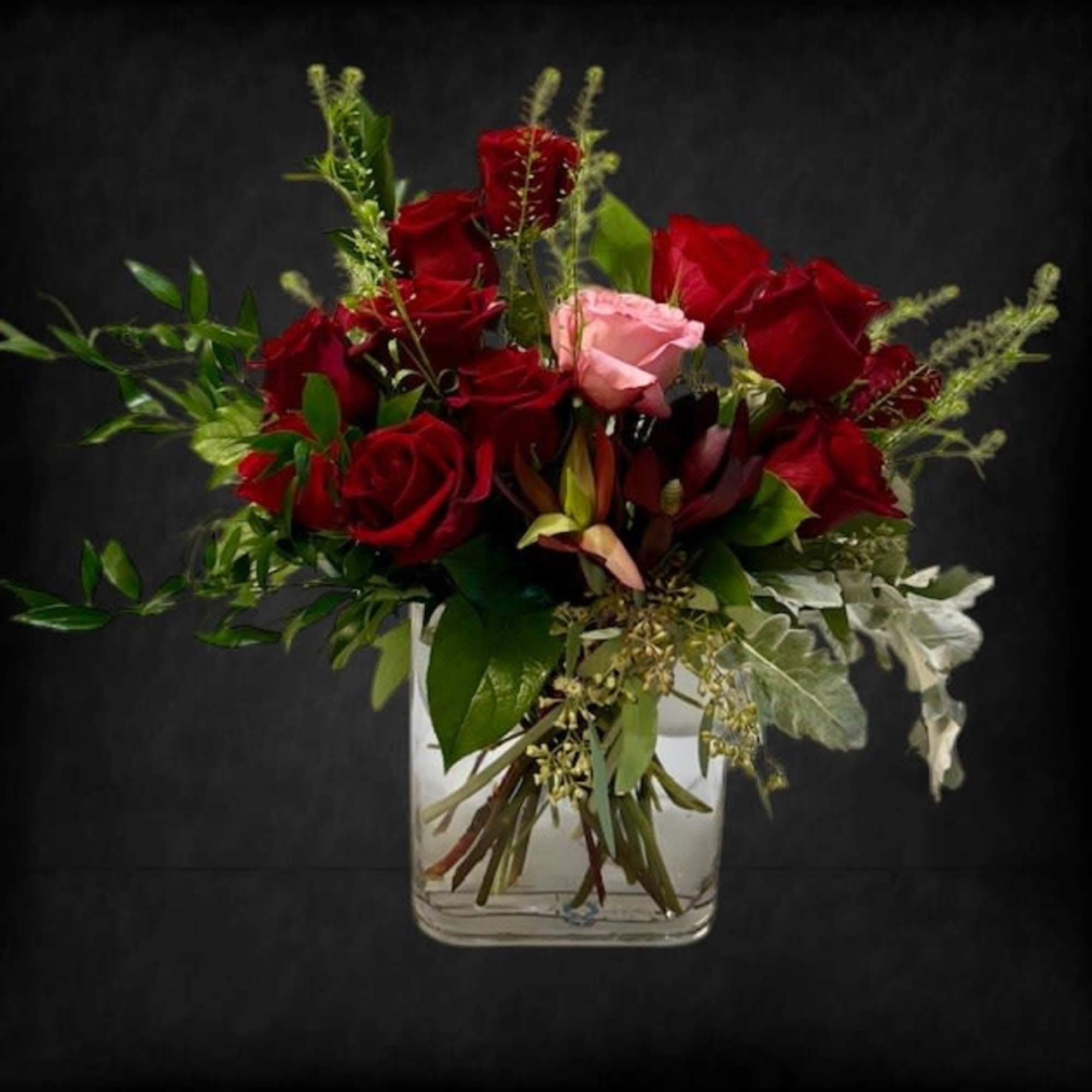A breathtaking arrangement that speaks of love, devotion, and individuality. Eleven deep