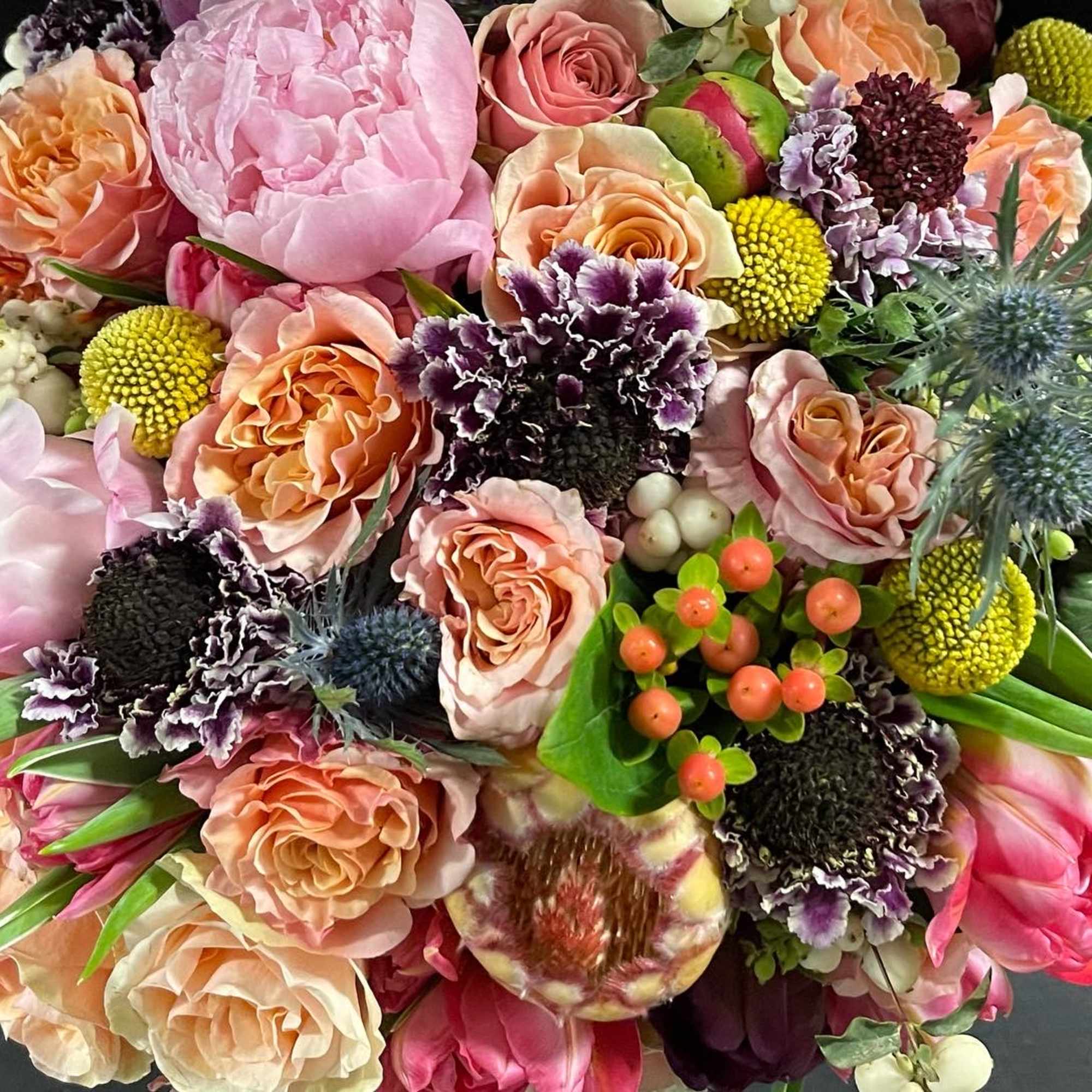 Garden style roses, scabiosa, ranunculus, proteas just to name a few. This