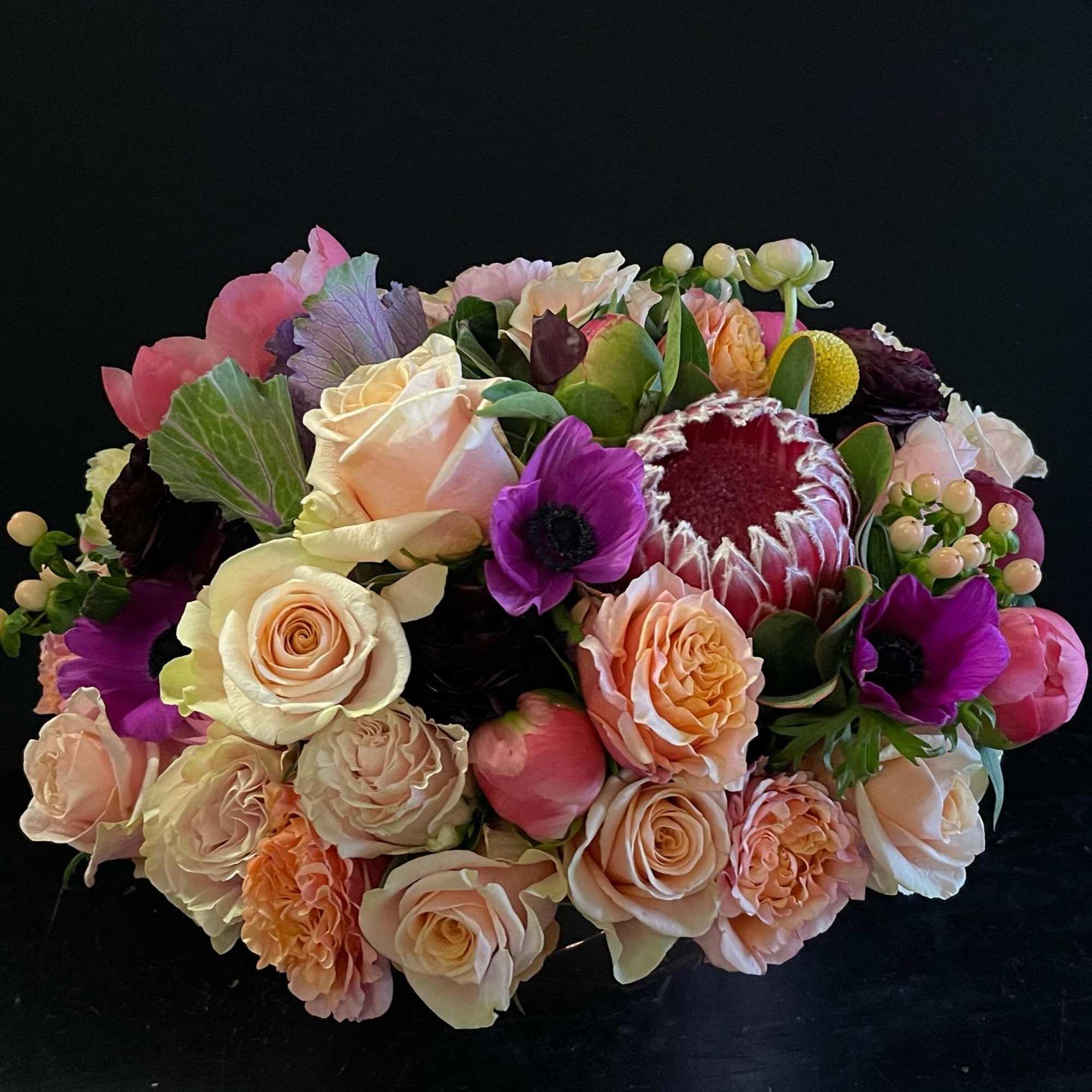 Garden style roses, scabiosa, ranunculus, proteas just to name a few. This