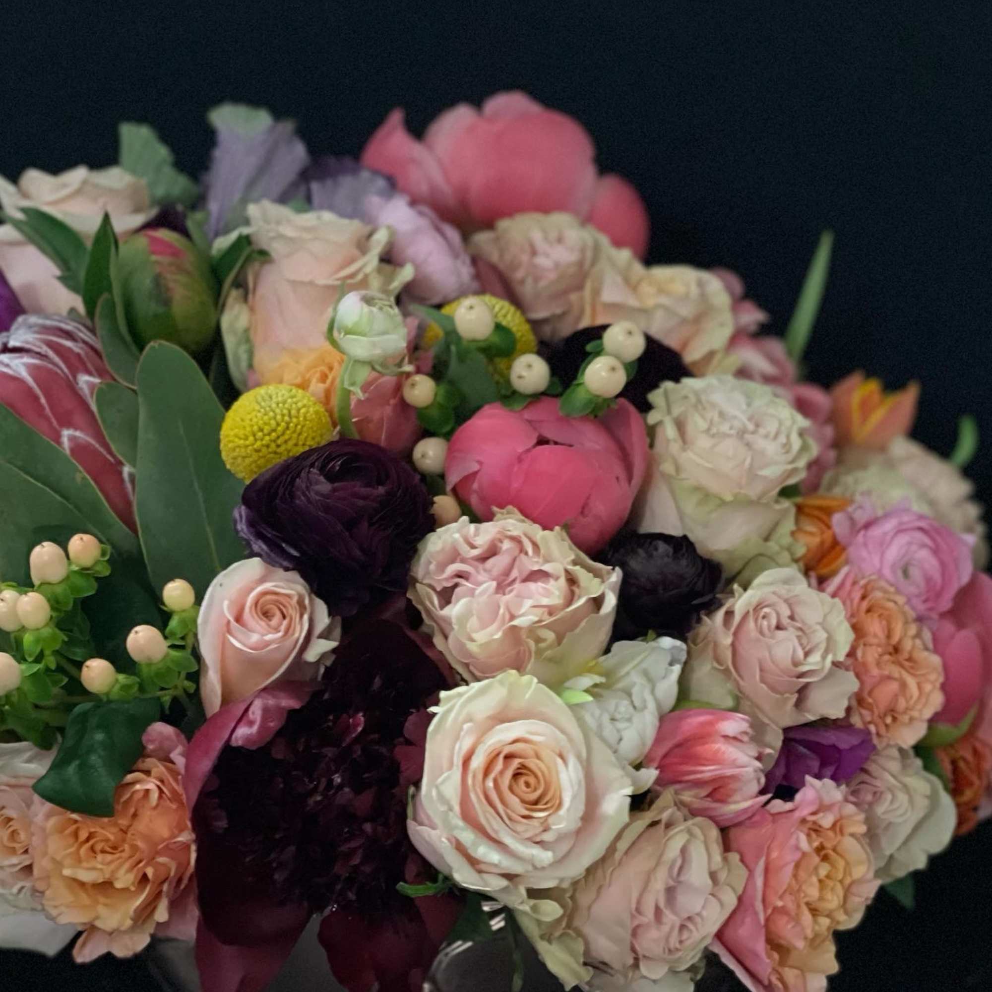 Garden style roses, scabiosa, ranunculus, proteas just to name a few. This