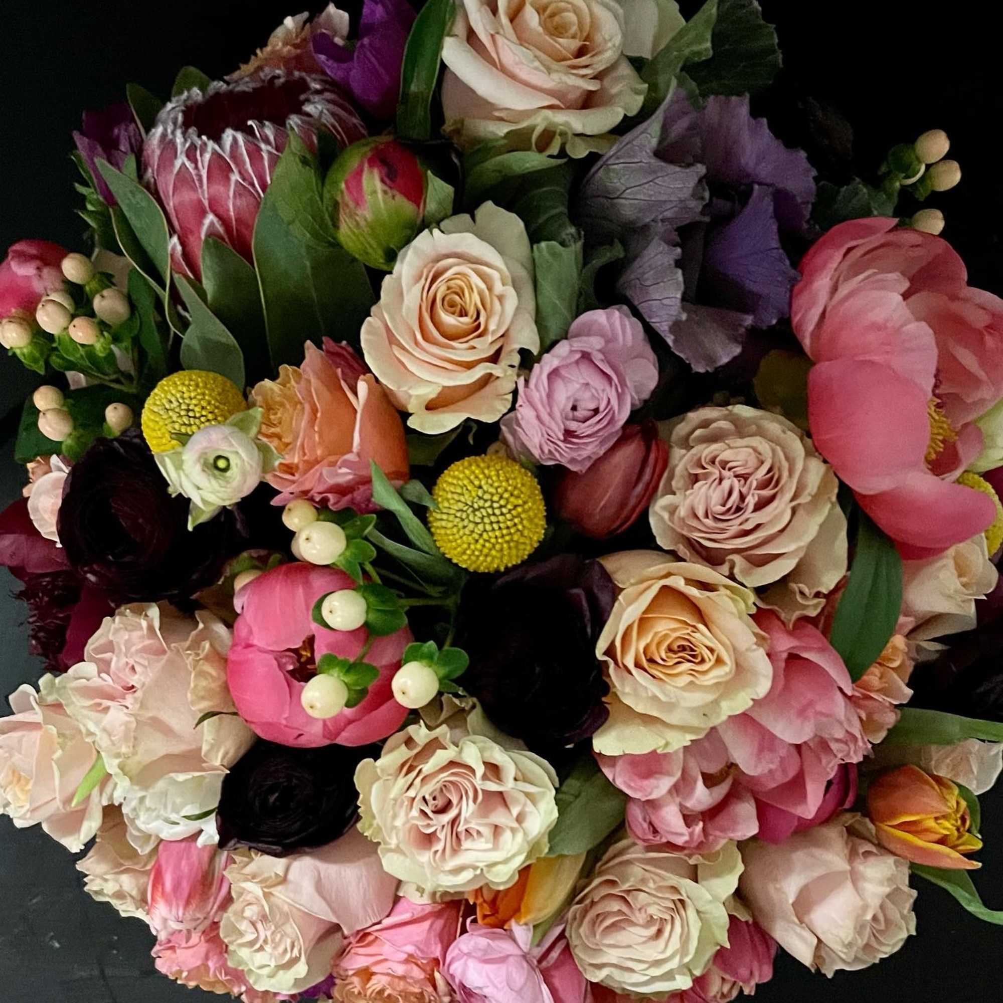 Garden style roses, scabiosa, ranunculus, proteas just to name a few. This