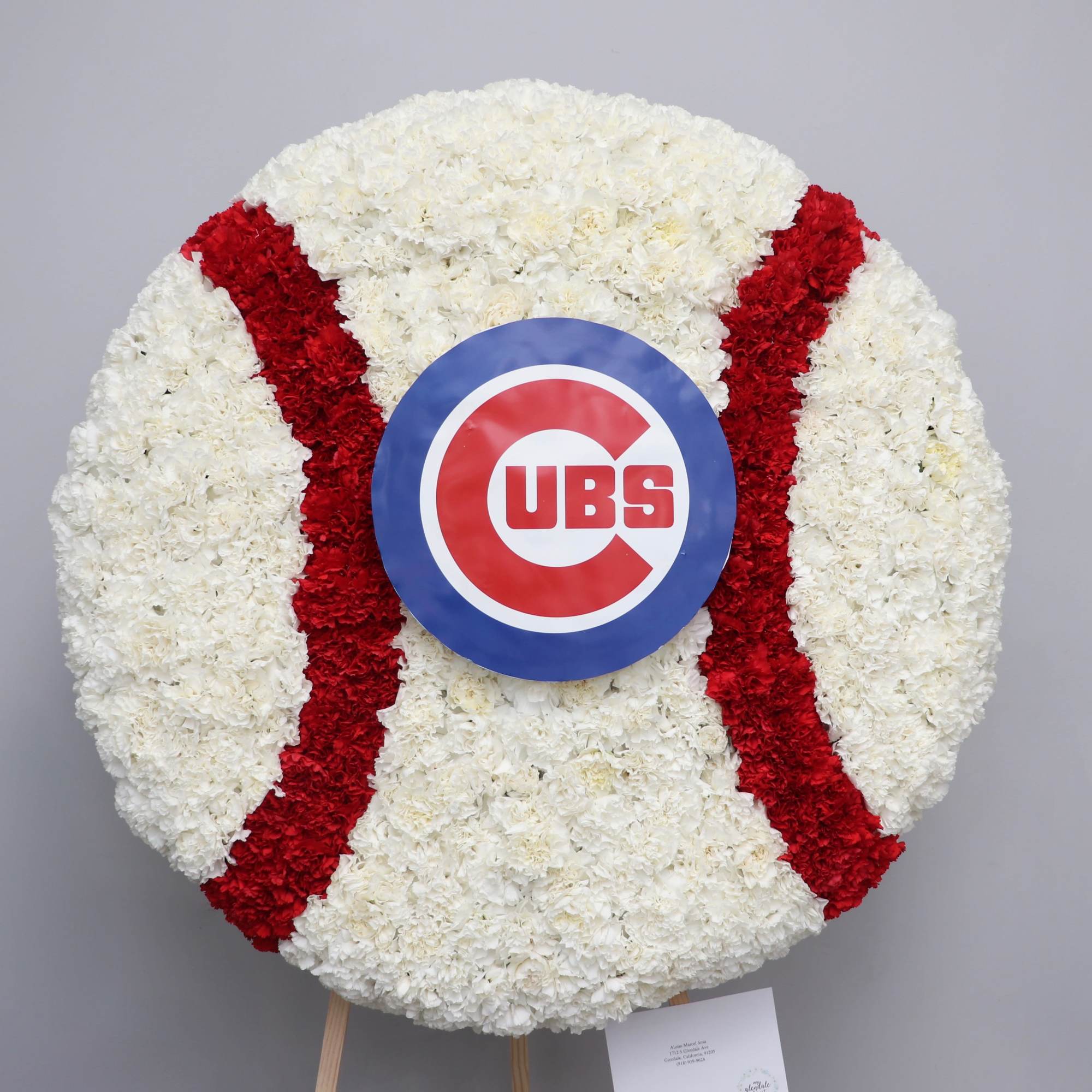 This full wreath contains custom flowers . The standard size is approximately