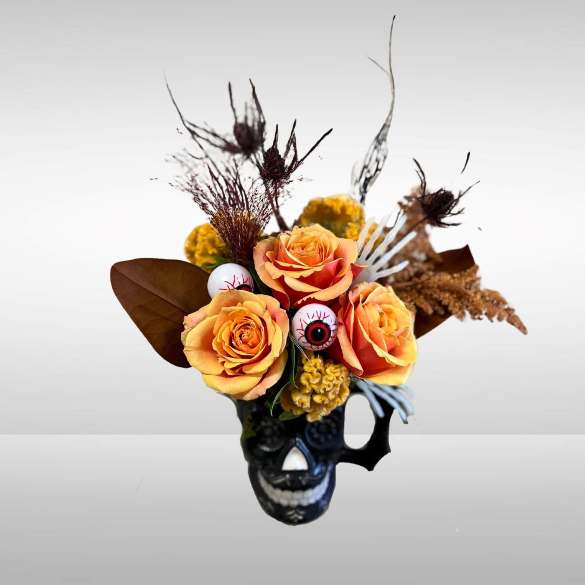 Recipe: Orange Roses, Sorghum, Celosia, Greens and more with halloween accents in