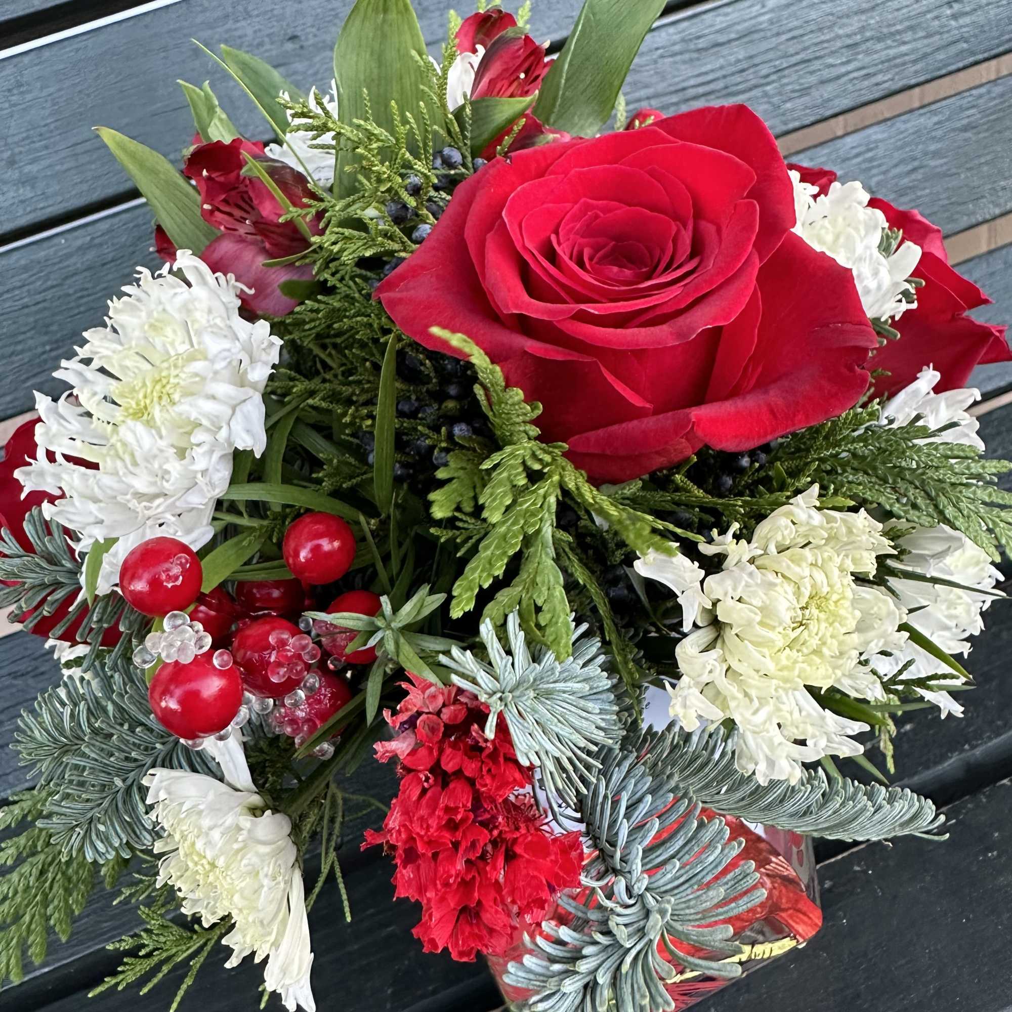 Red, White and Green in a Cardinal vase.
Fresh cut and always hand