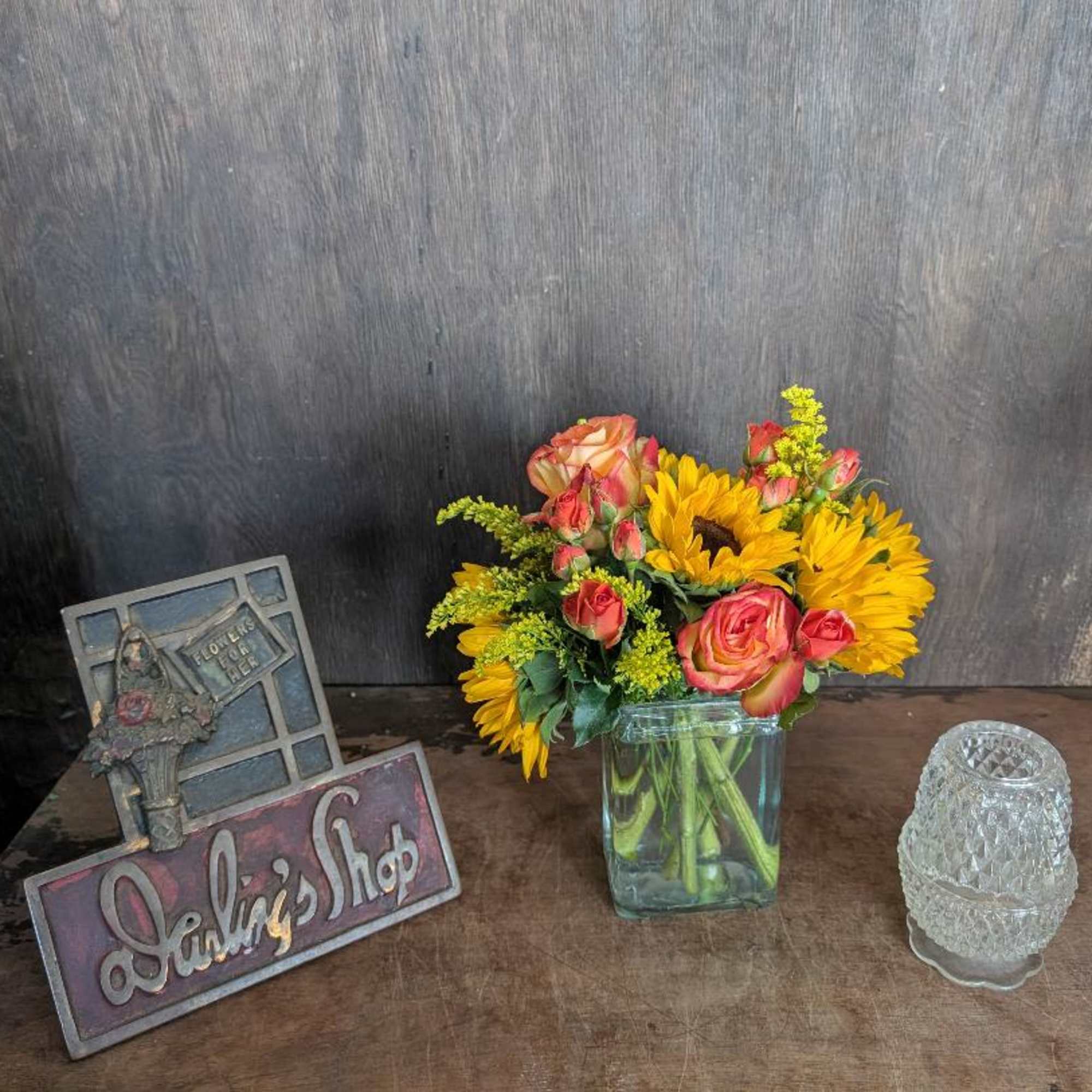 Sunflowers, spray roses, roses and filler -- Bright just right for any