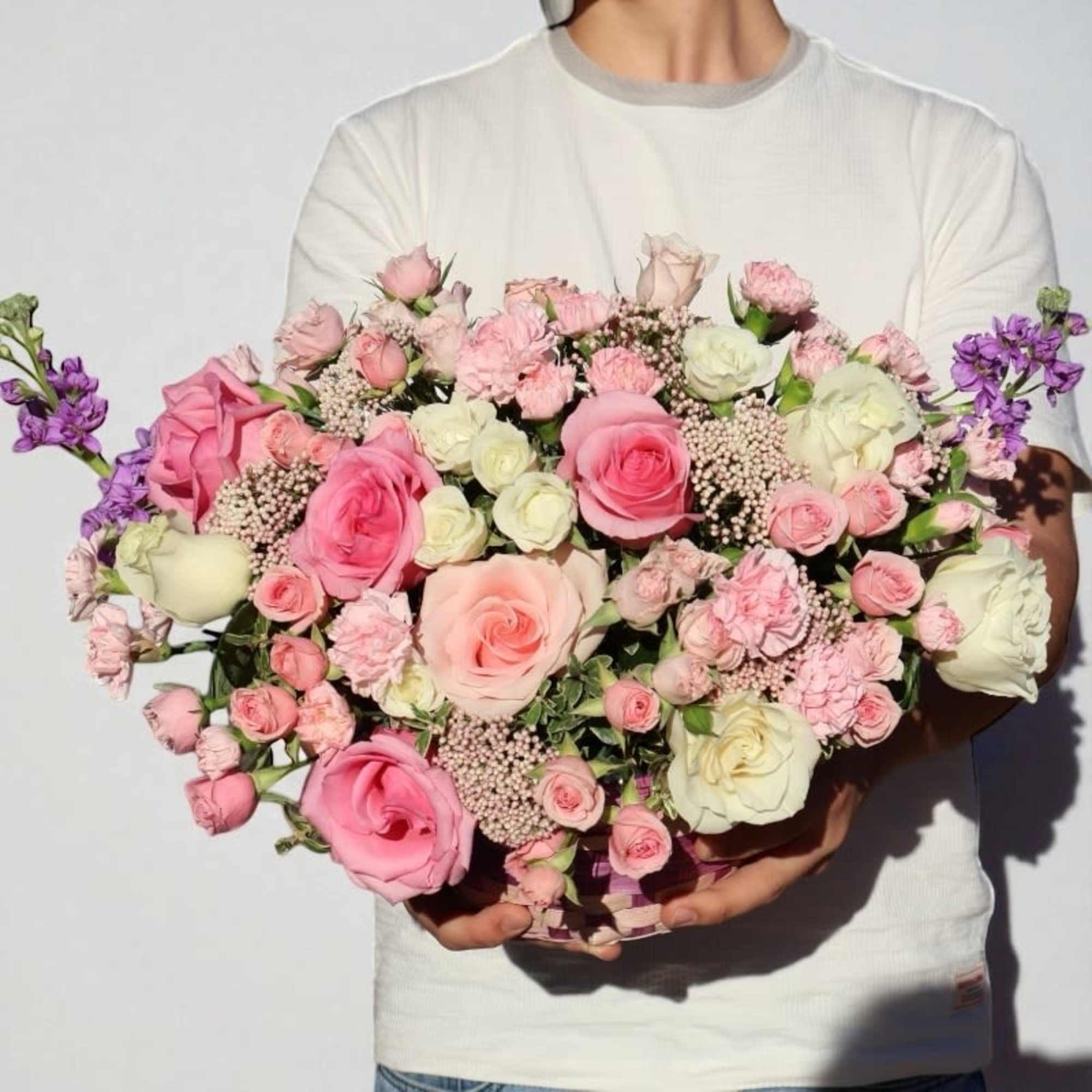 A tender symphony of soft pinks, creamy whites, and gentle blush tones