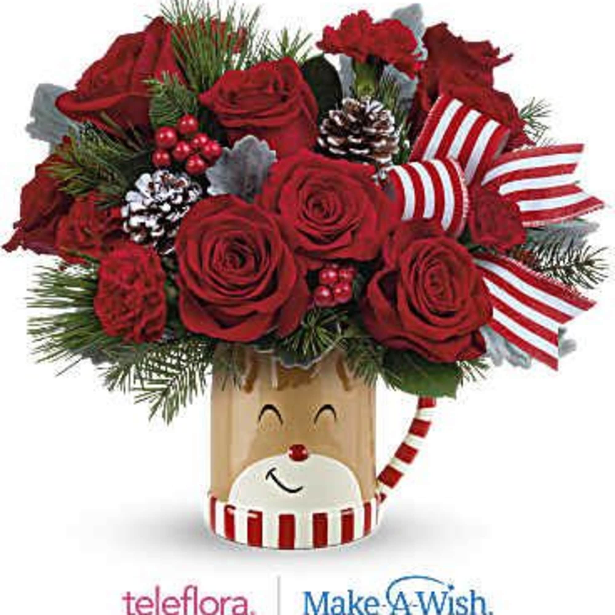 Overflowing with festive blooms, this adorable reindeer delivers your holiday wishes! The