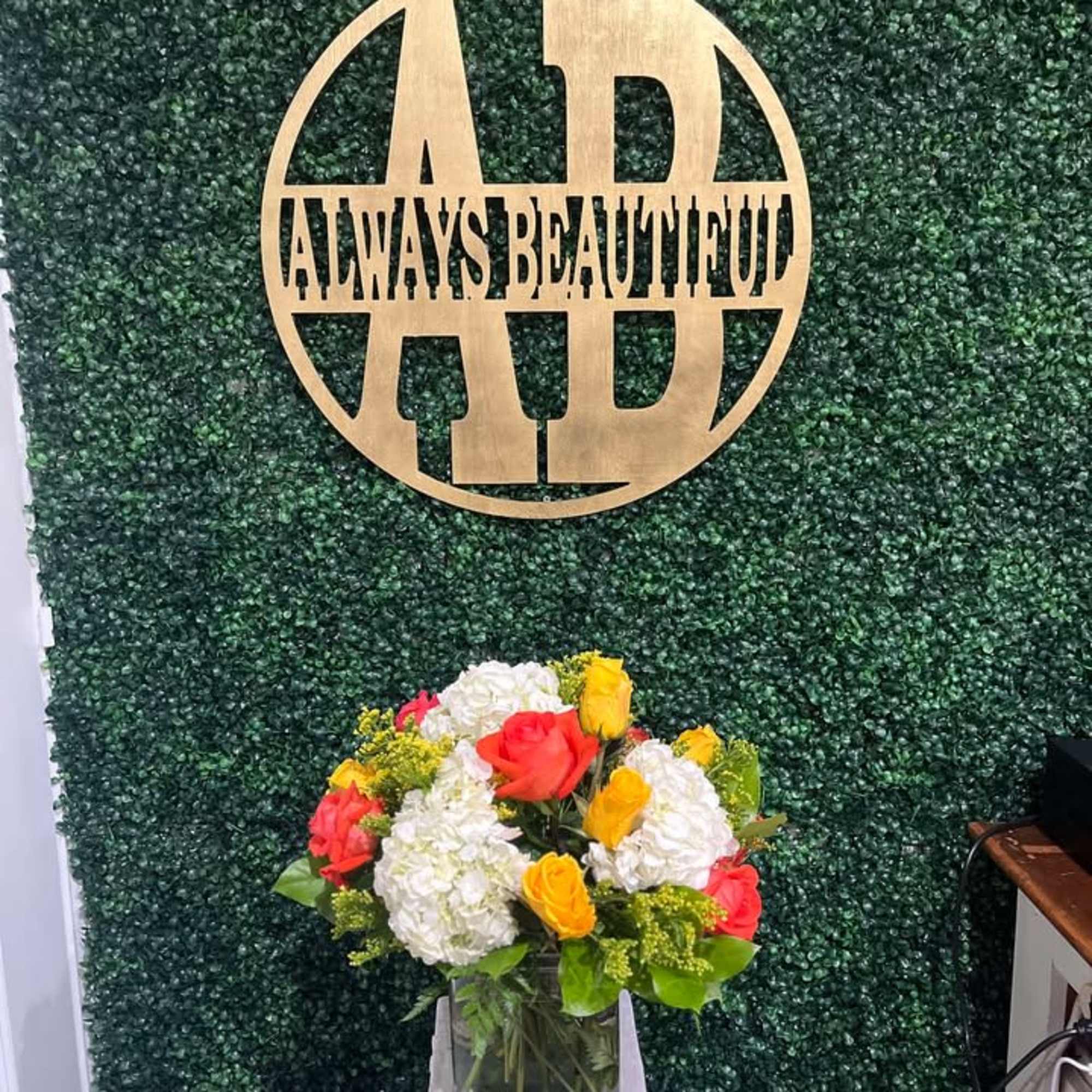 Brighten someone's day with this cheerful bouquet. This arrangement includes roses and