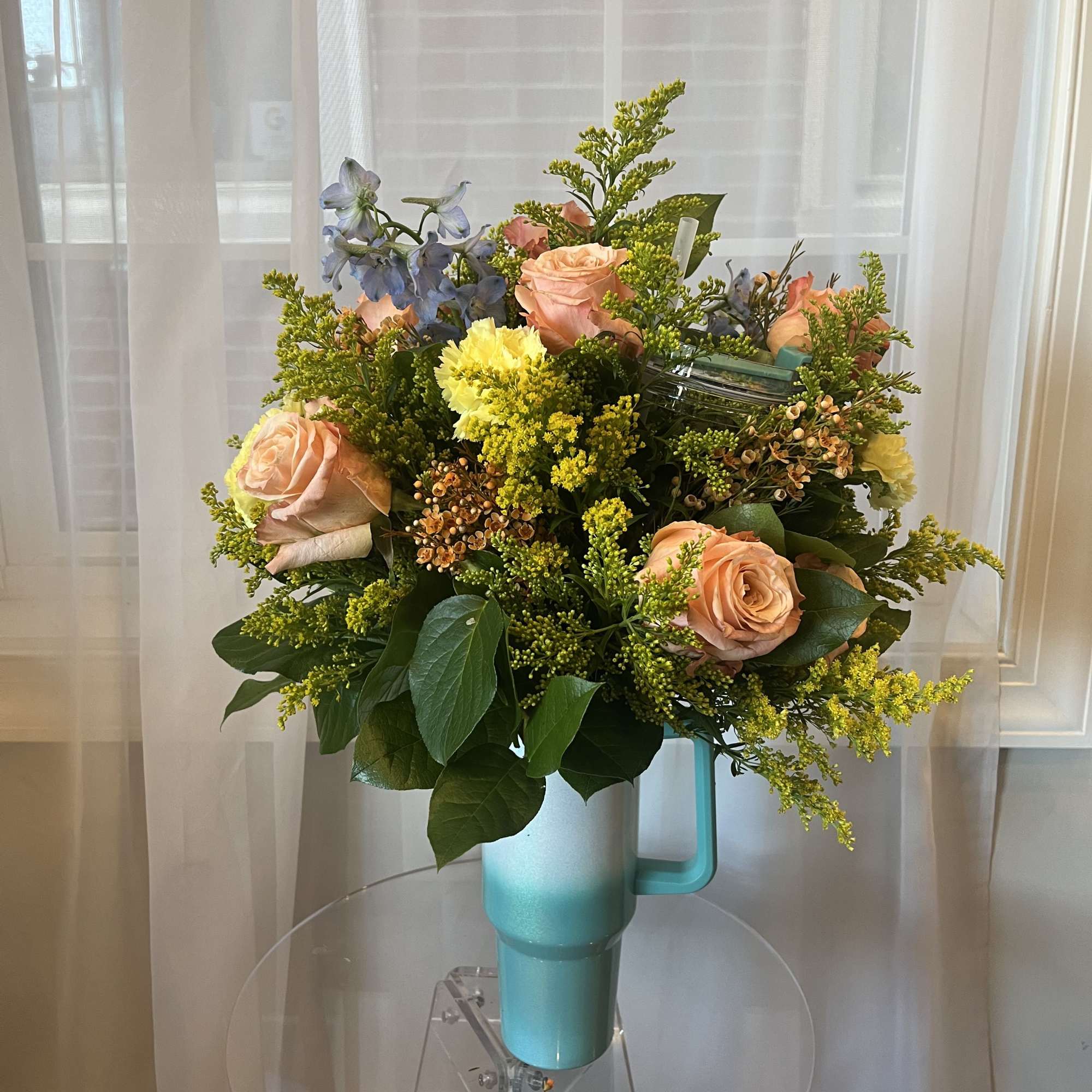 Let us create a beautiful, custom-designed tumbler arrangement in a tumbler of