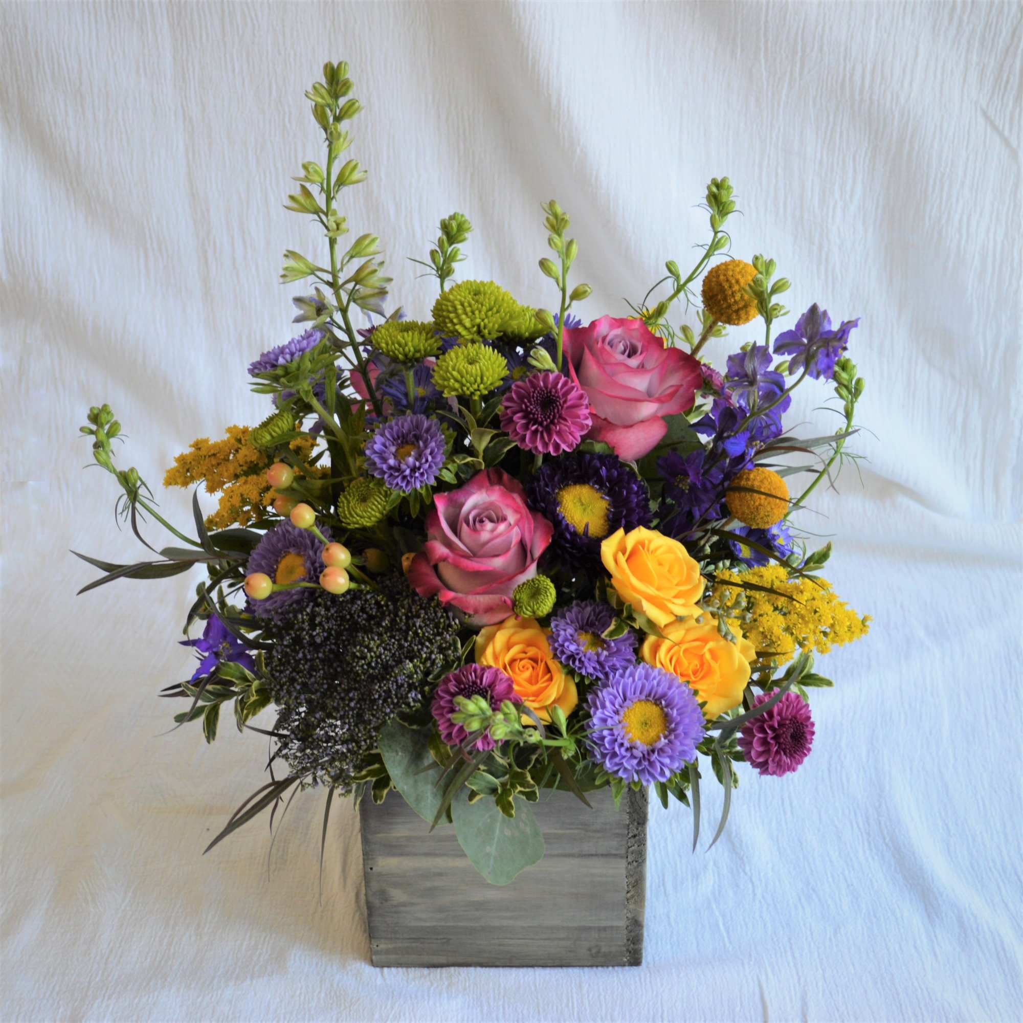 Gardeny and fresh, this 5x5 wooden box is full of complimentary colors