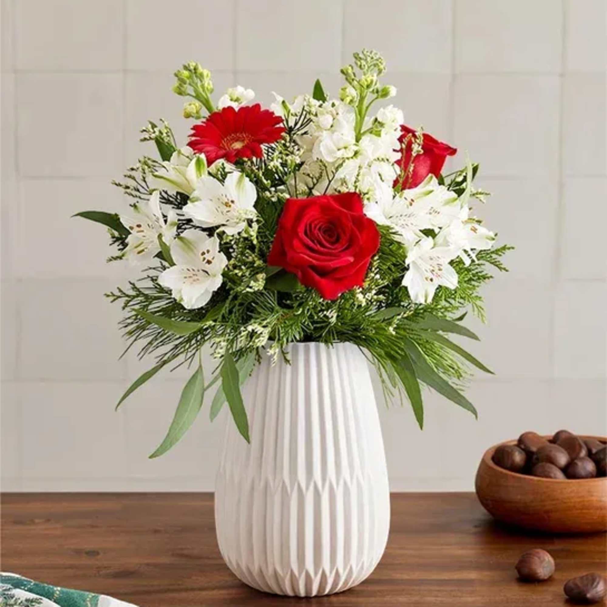 Celebrate the most magical time of year with our dazzling bouquet. A
