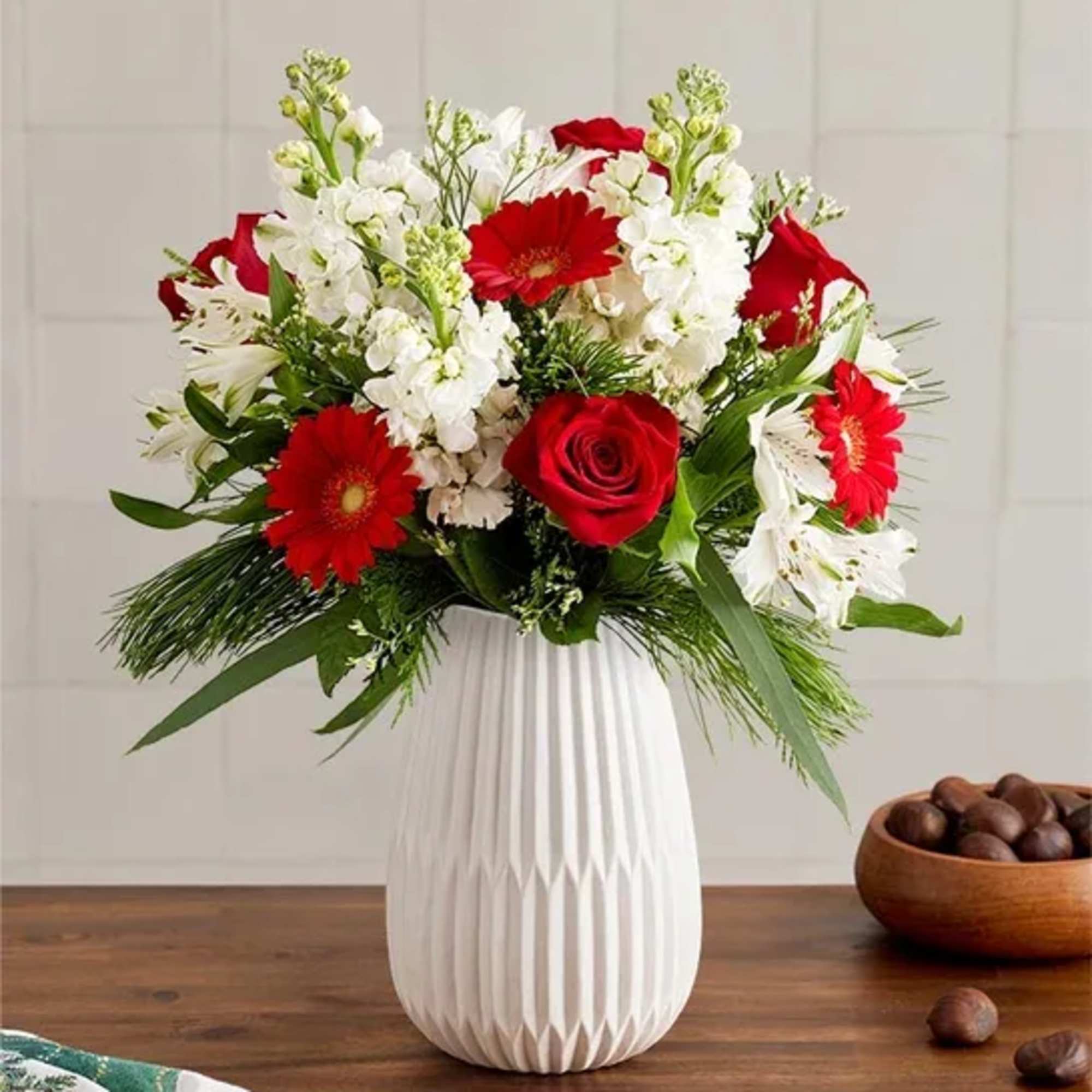 Celebrate the most magical time of year with our dazzling bouquet. A