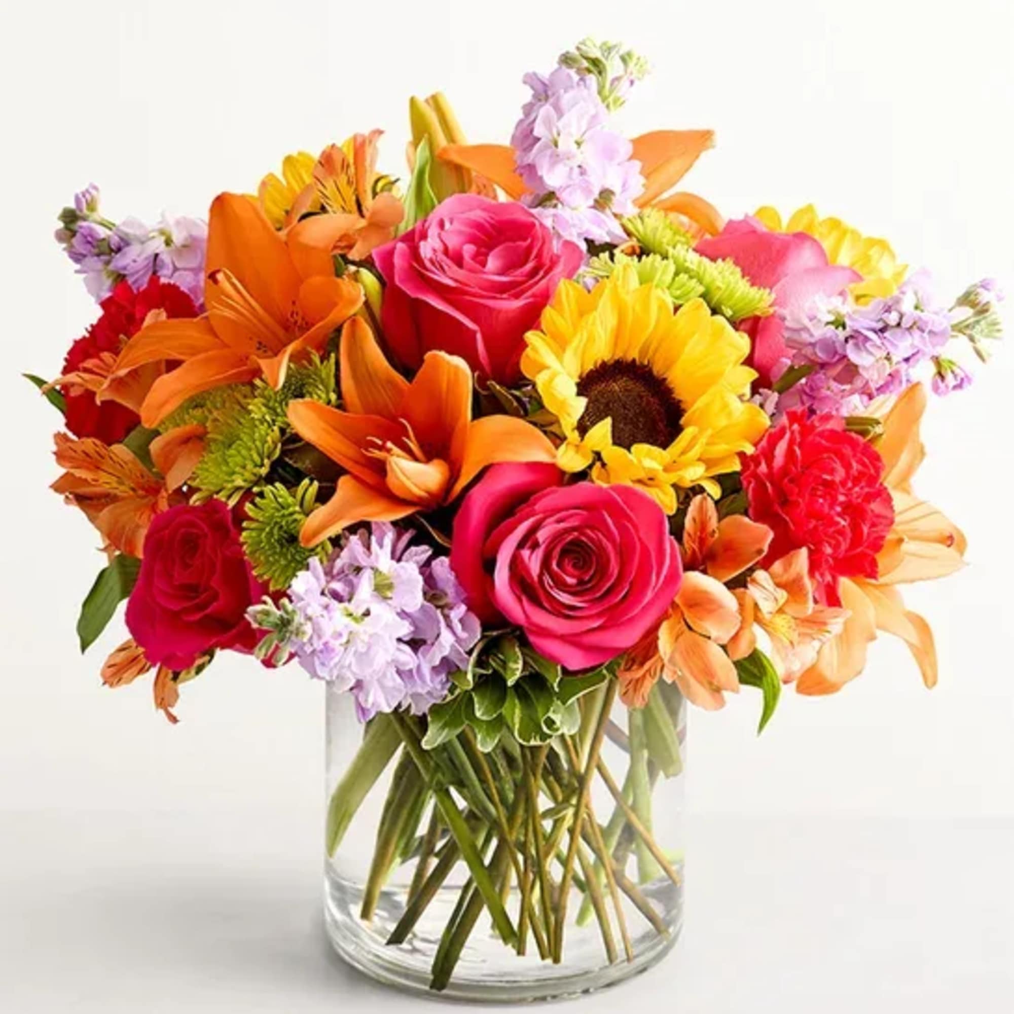 Like a warm embrace, our vibrant flower bouquet delivers your sentiments to