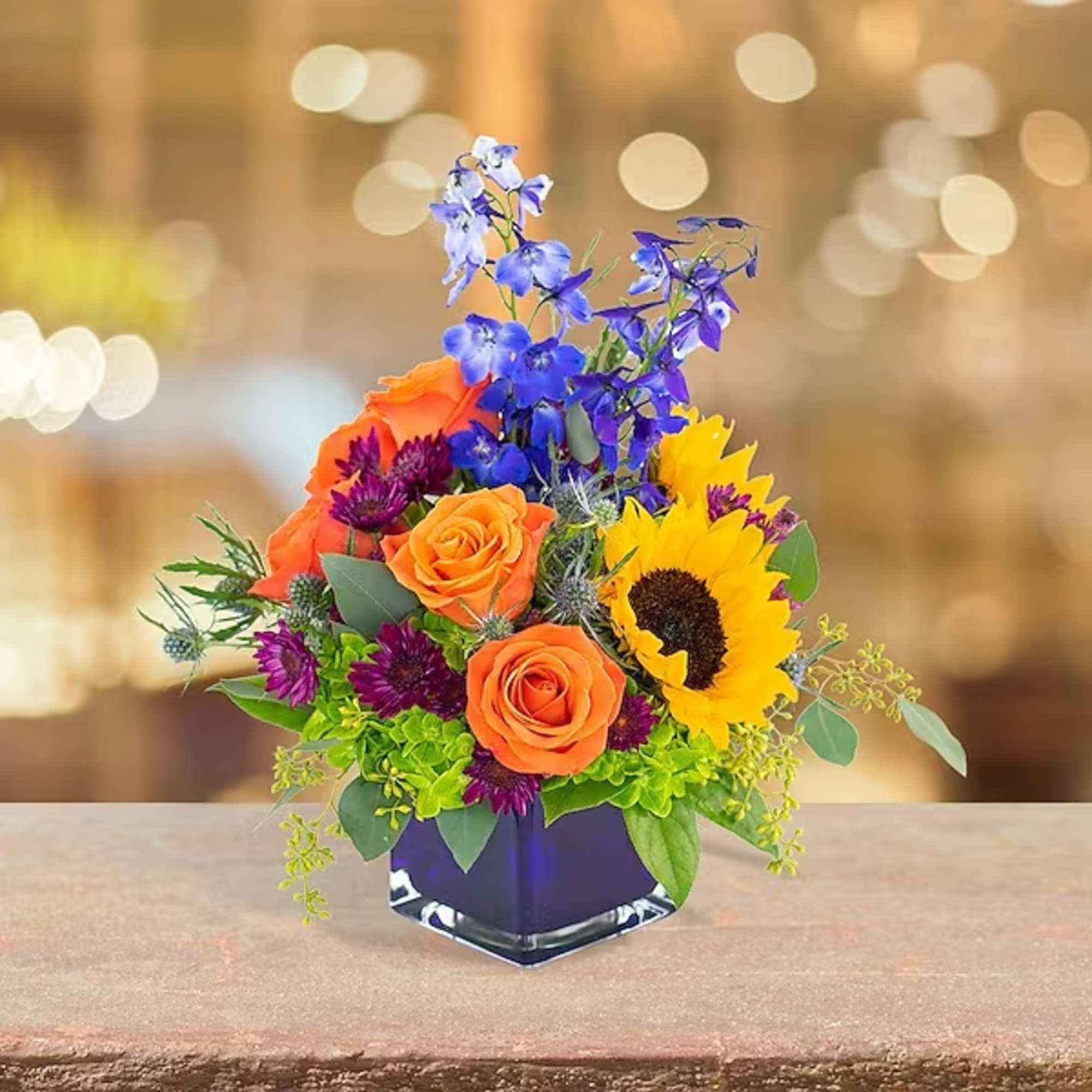 This spectacular, brilliantly and professionally hand-designed flower bouquet, Seasonal Lights, features exotic-looking