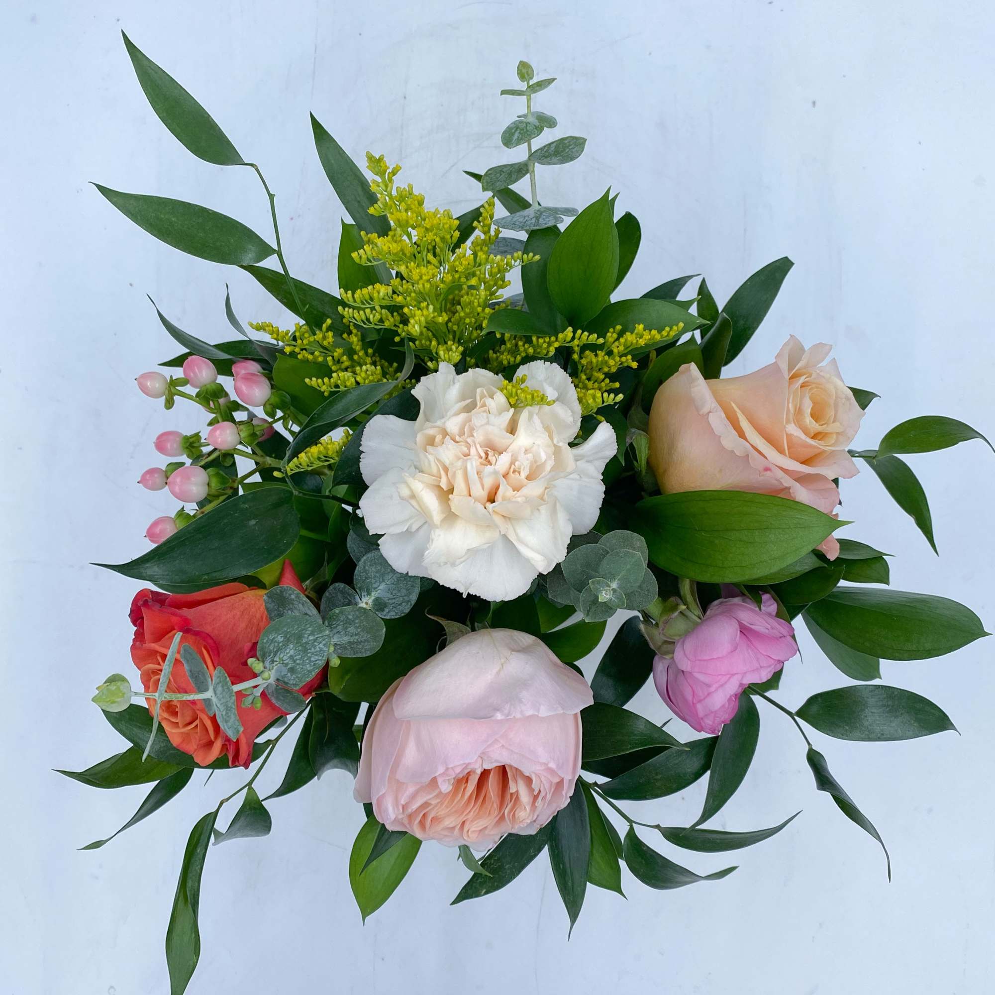 Petite Paloma is arranged with a Juliet Garden Rose, a Shimmer Rose