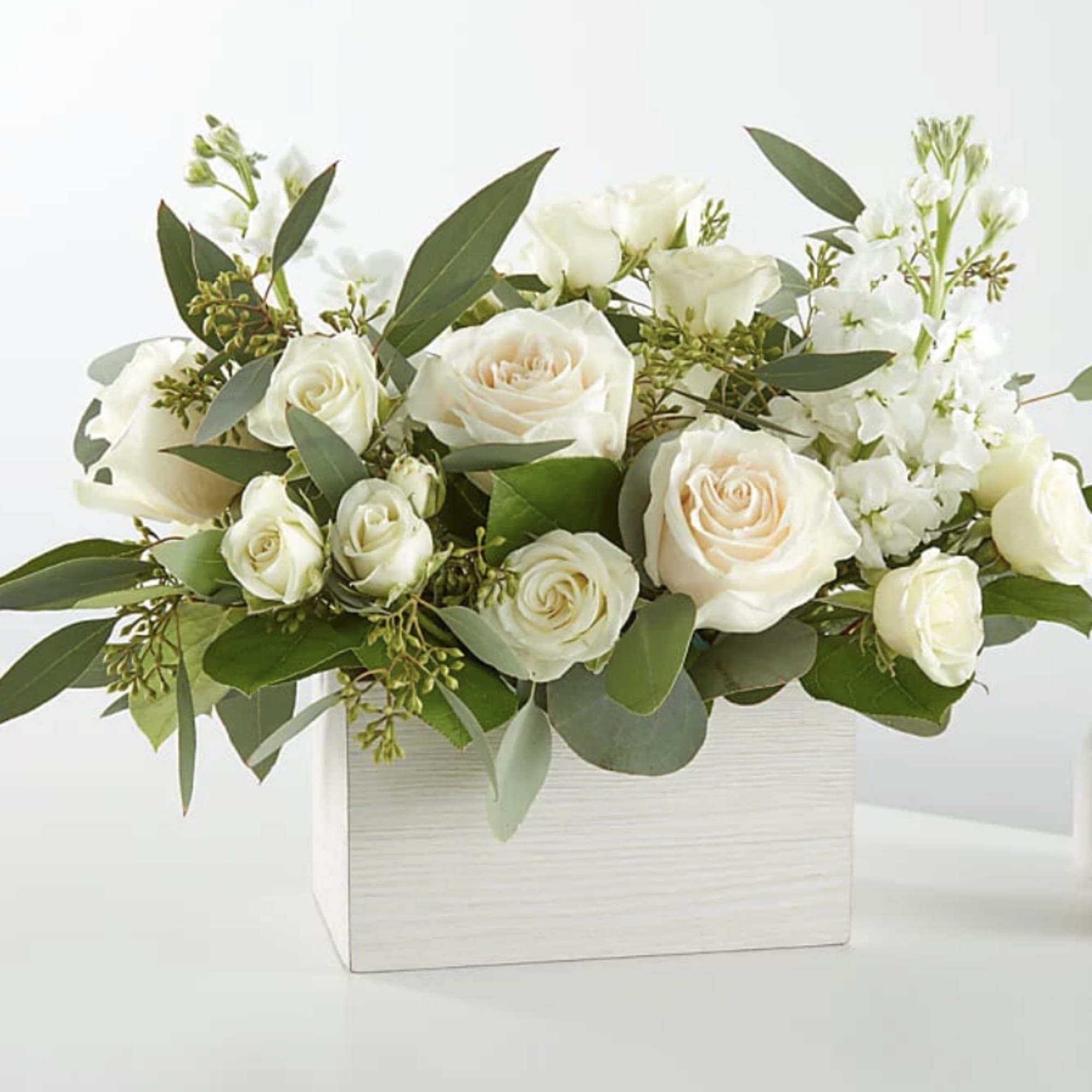 Create a serene and timeless atmosphere with our Fresh Linen Box Bouquet