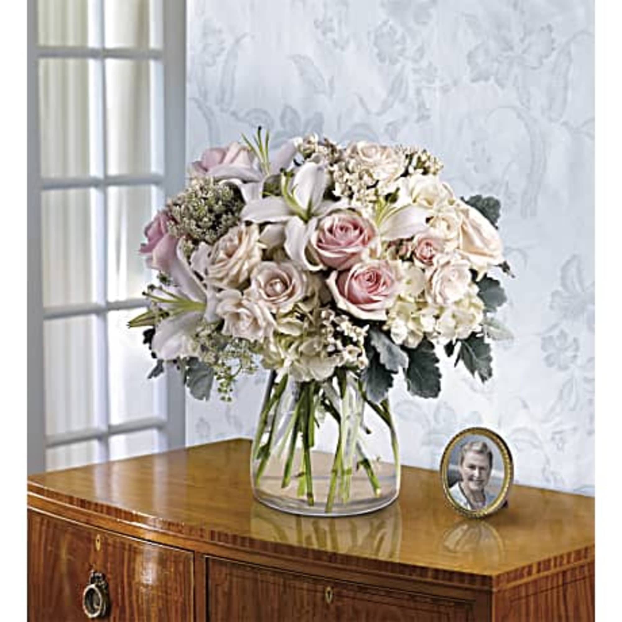 A whisper-quiet affirmation of love. Subtle shadings of pink and white roses