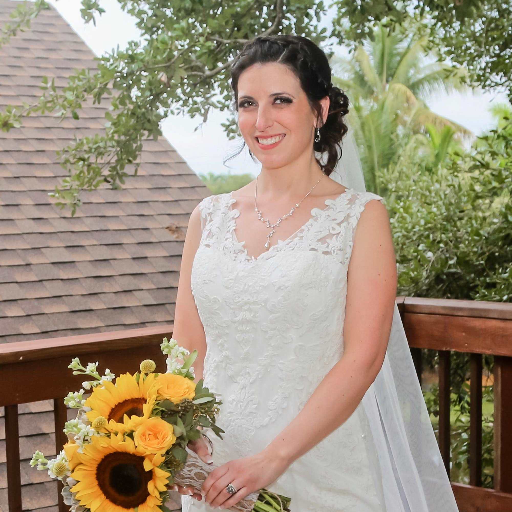 Elevate your wedding with the Jenna Sunflower Wedding Bouquet. Stunning sunflowers, yellow