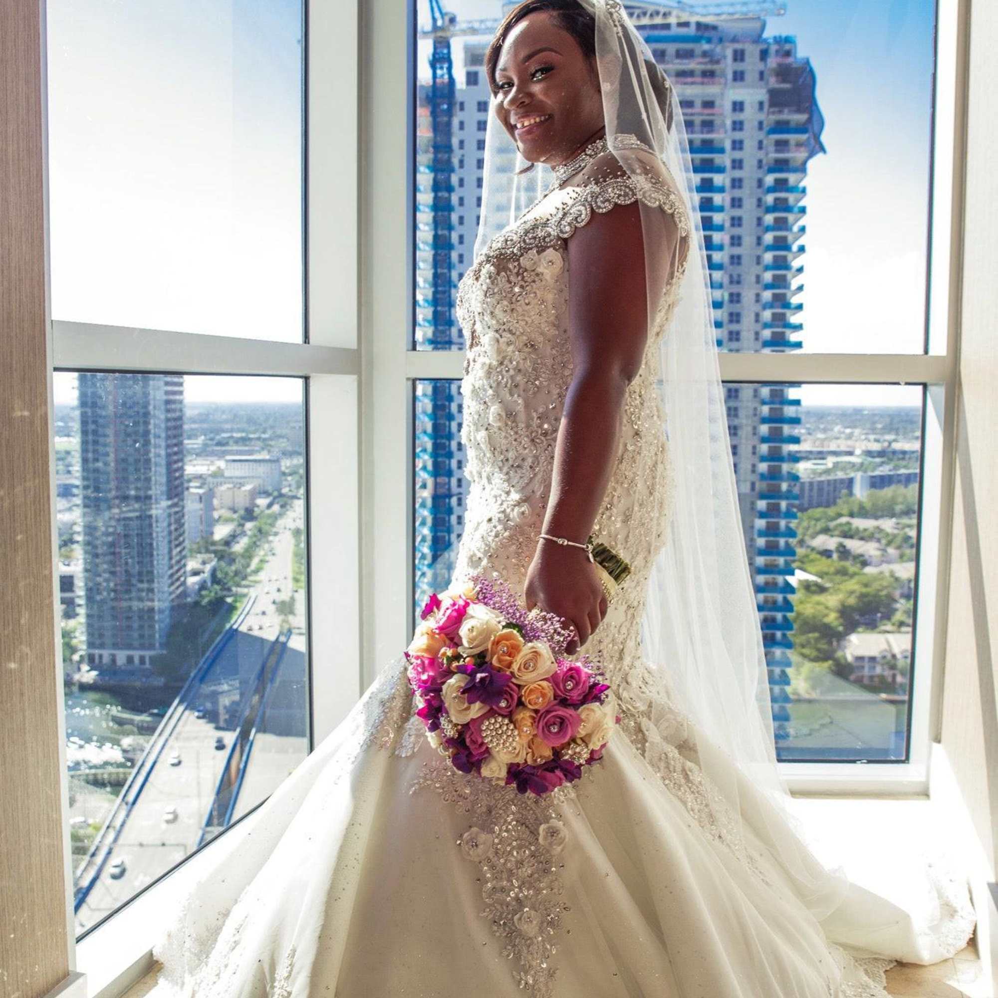 Indulge yourself with our Tyshana Wedding Bouquet, a blend of regal purple