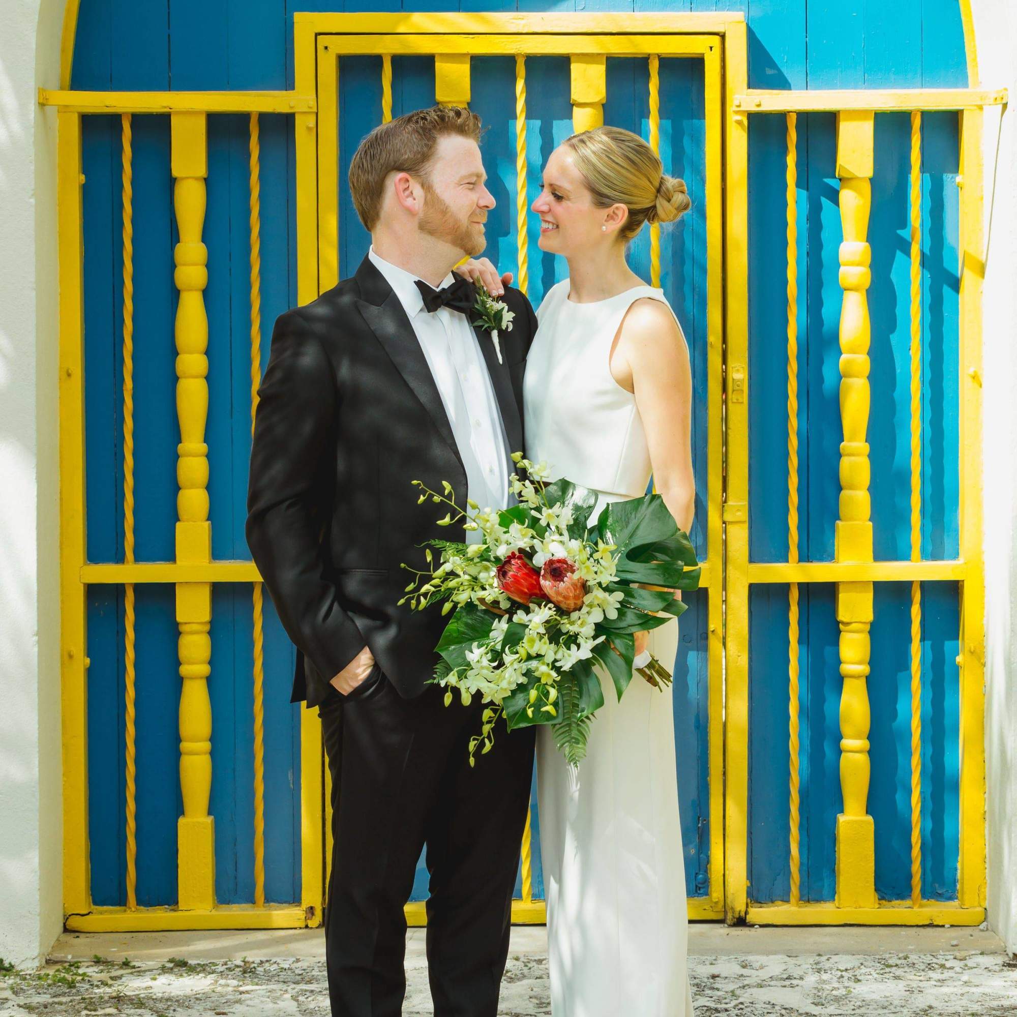 Indulge in the elegance of our Whitney Tropical Wedding Bouquet. Crafted with