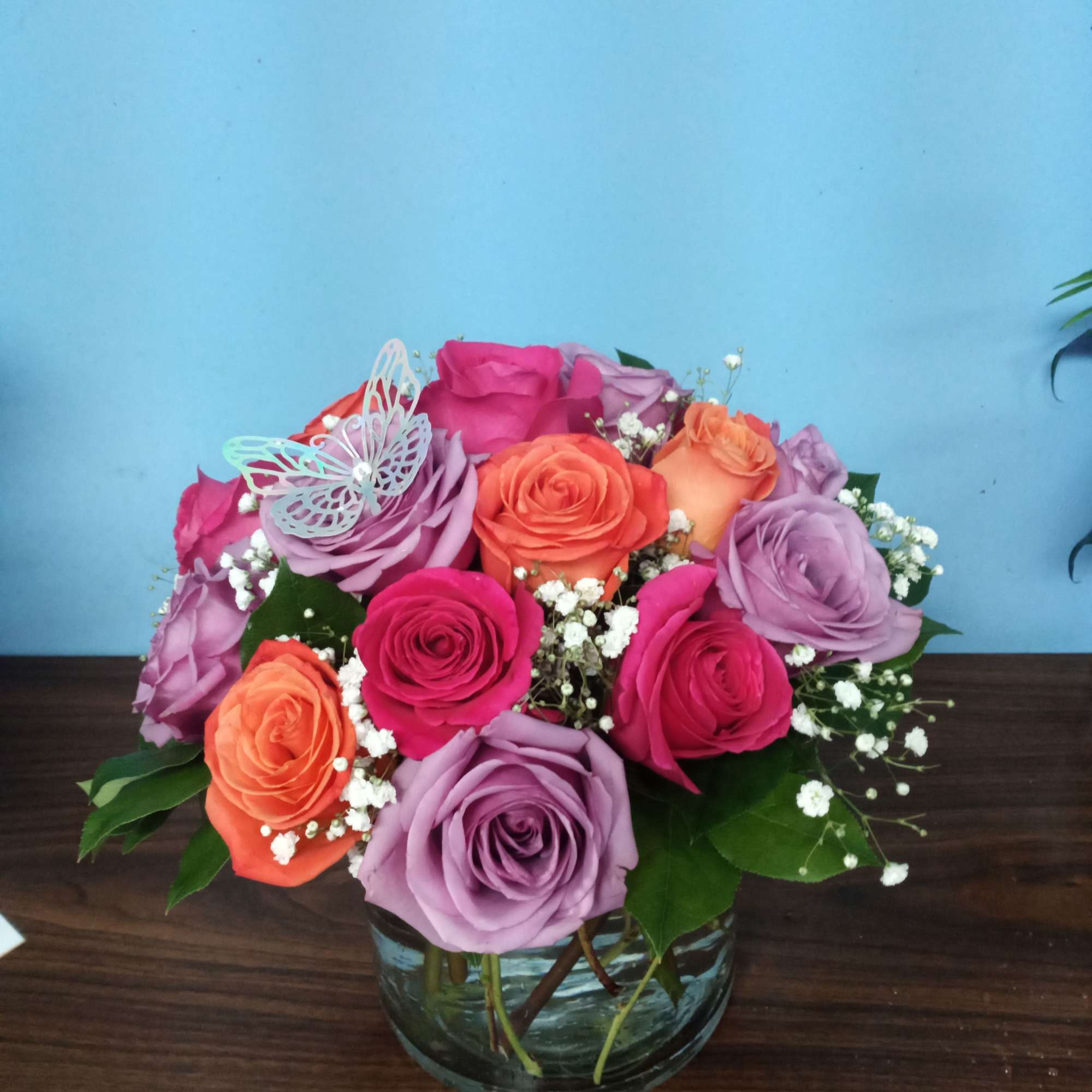 A lovely bowl of colorful roses brightens and lifts any room (and