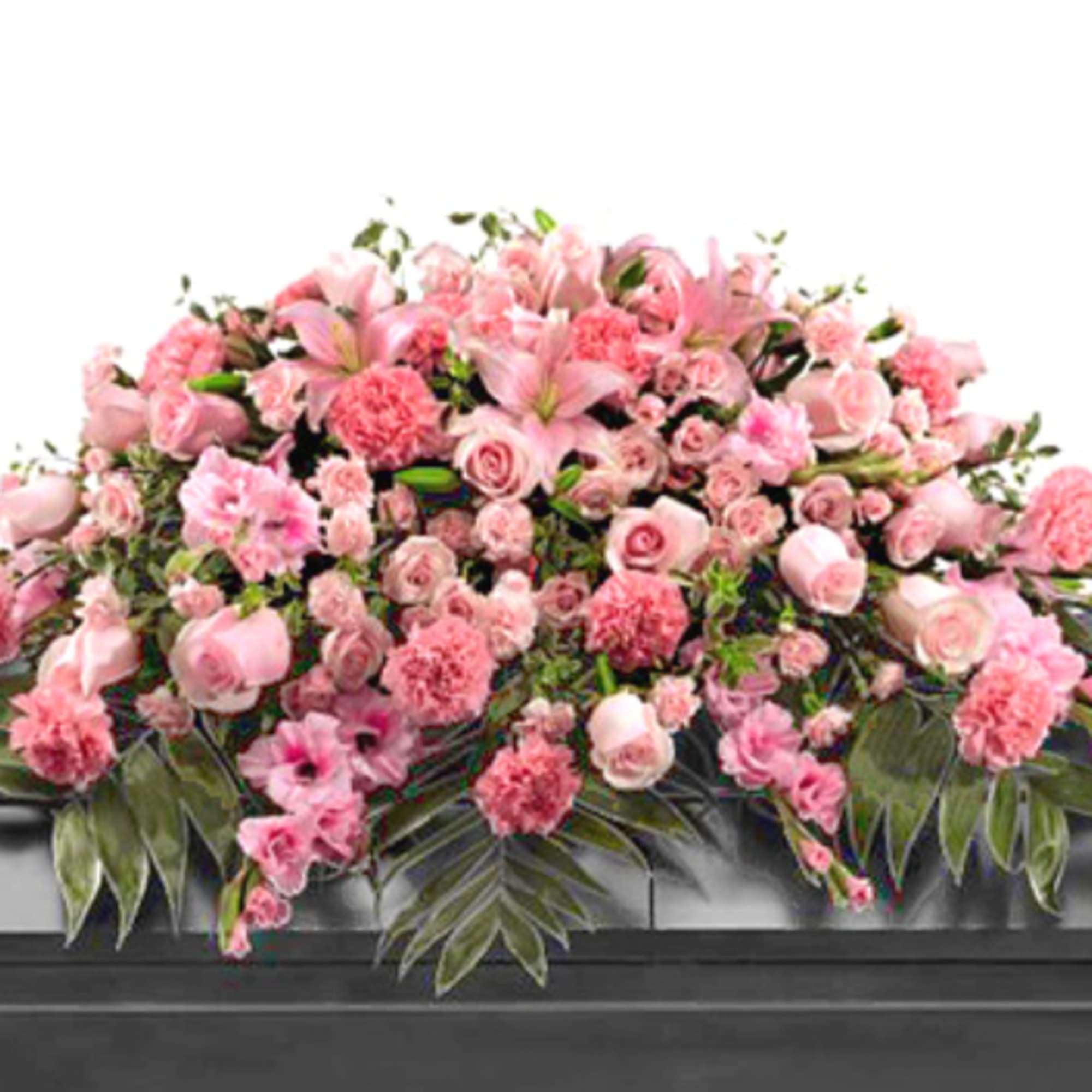 The FTD; Sweetly Rest; Casket Spray is a wonderful way to commemorate