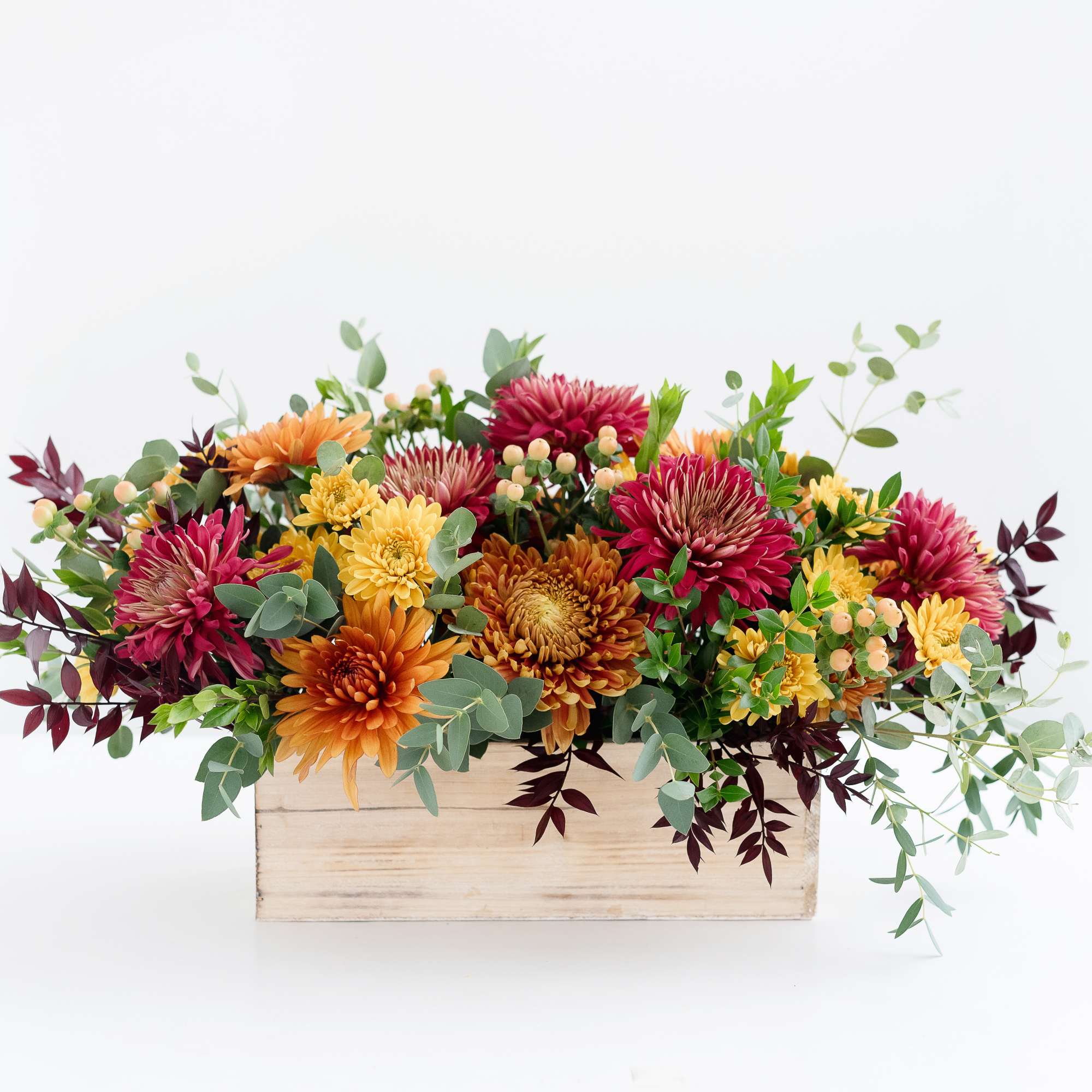 The best of fall colors! A stunning combination of premium, fall-colored mums