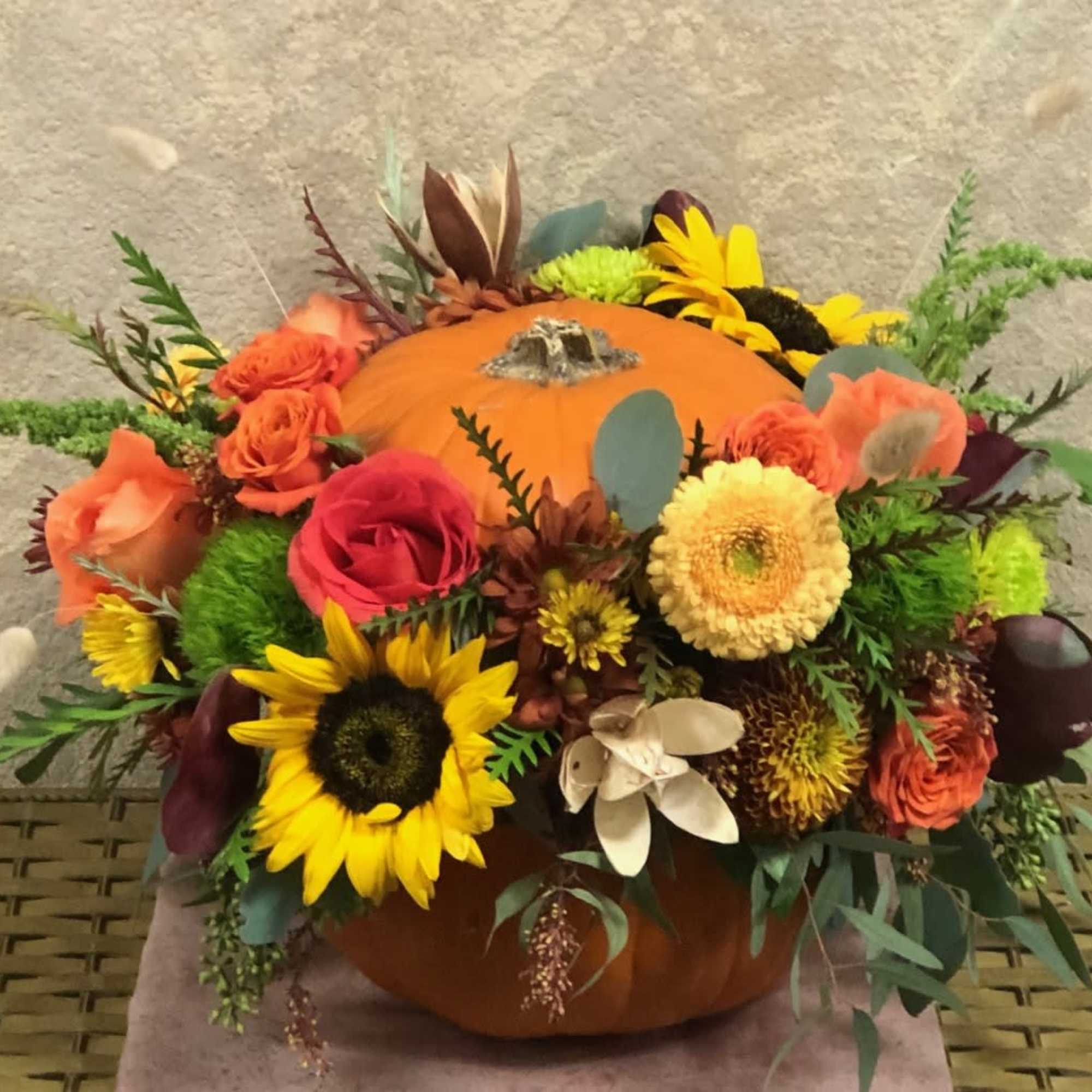 Type of Flowers: Yellow Gerberas, Sunflowers, Pink and Orange Roses, Orange Spray