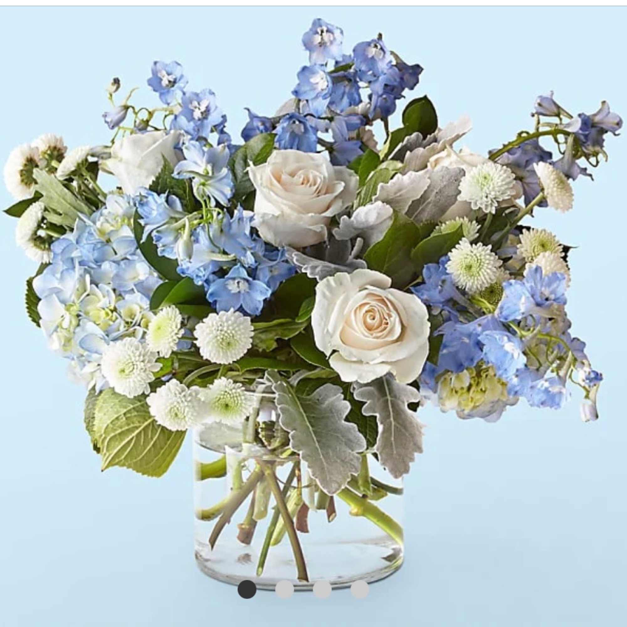 Let this uplifting arrangement be reminders of the clear skies ahead. Capturing
