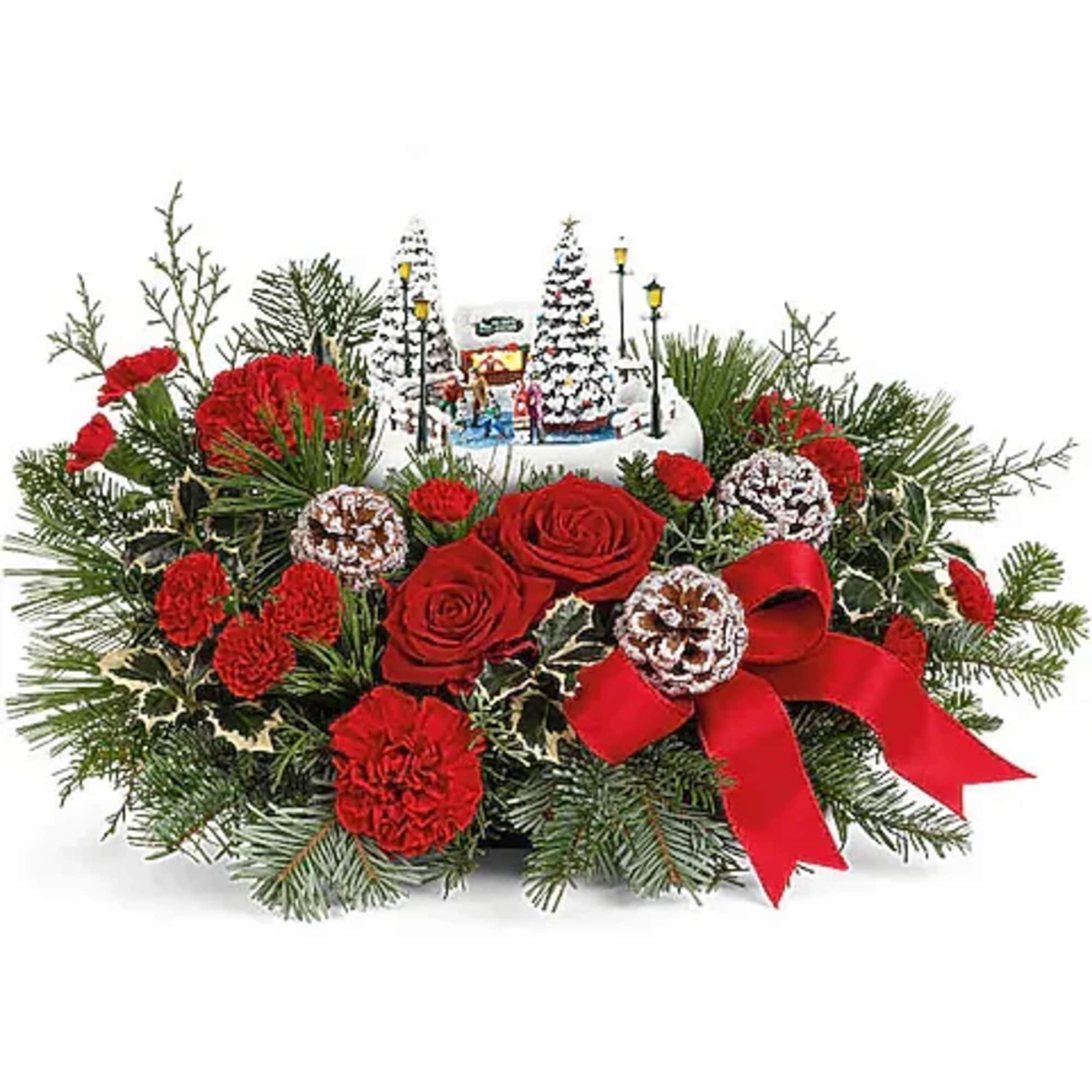 Celebrate the season with this delightful Thomas Kinkade collectible, nestled among festive