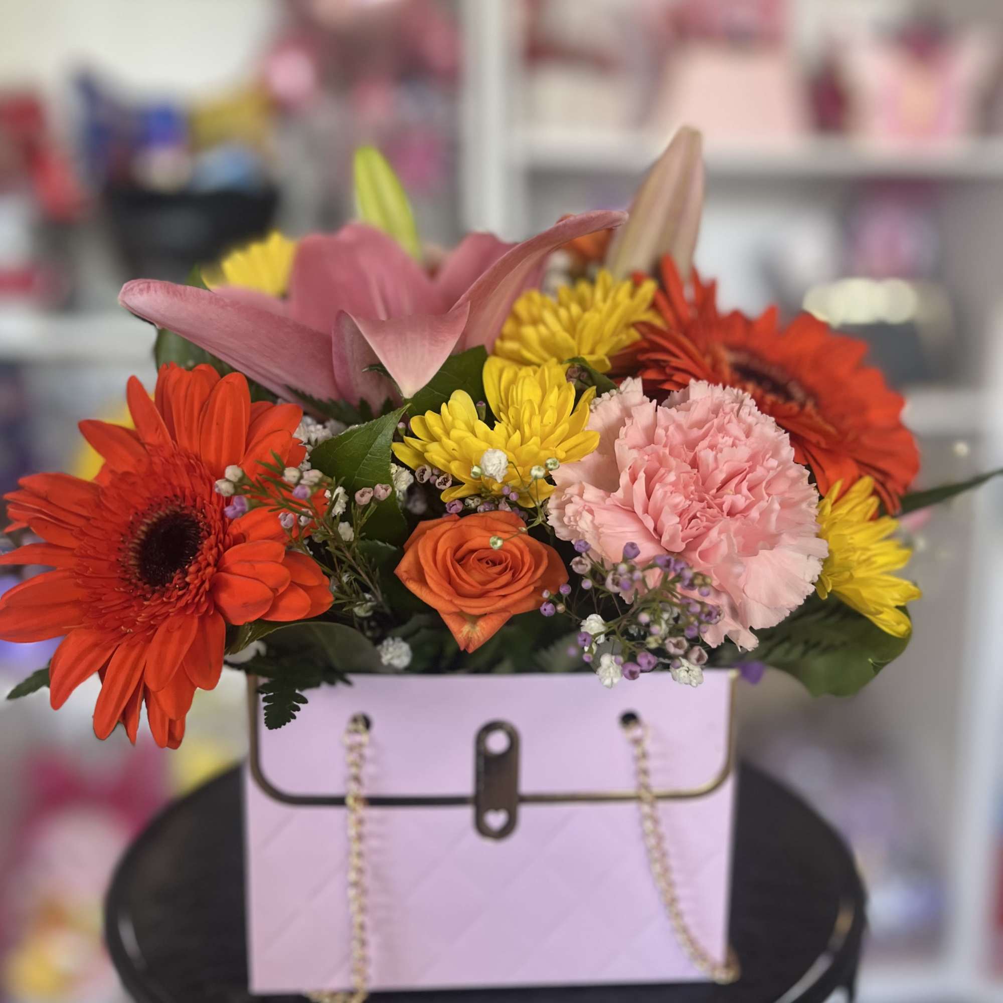 fresh flowers in purse setting 