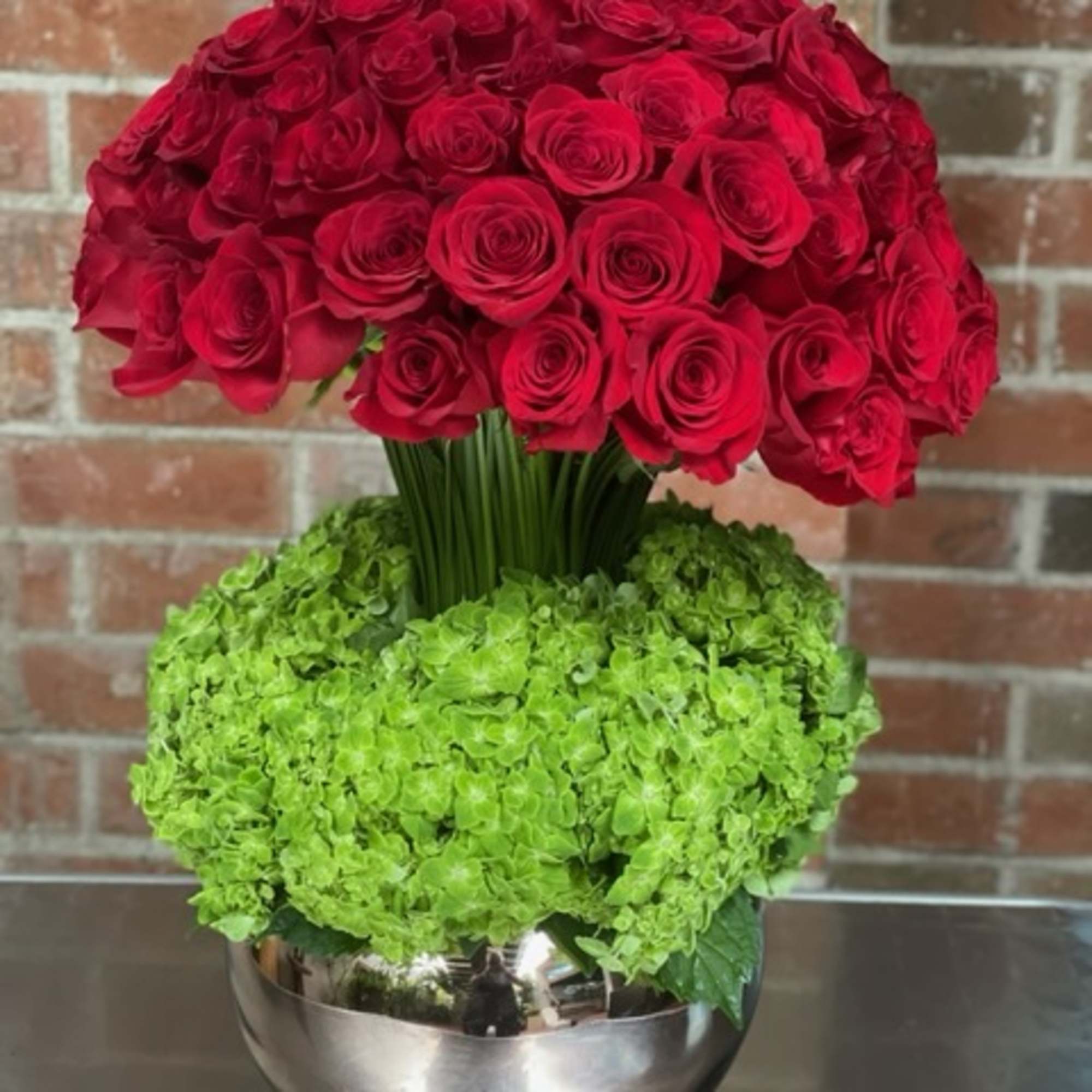 The fiery passion of red roses meets the refreshing allure of green