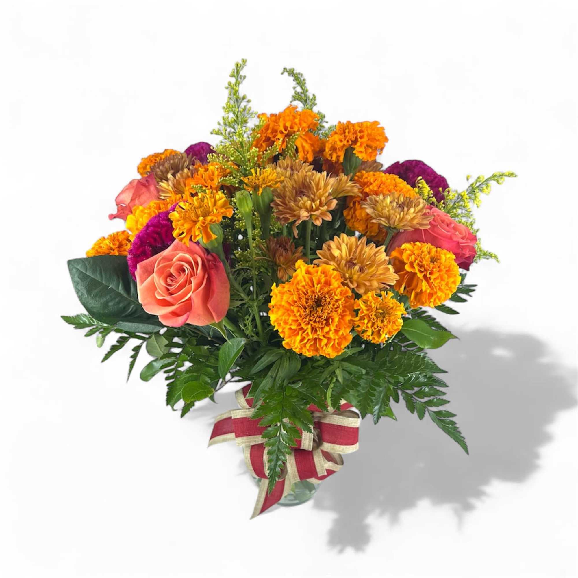 Illuminate your celebrations with our Velvet Glow Arrangement, a luxurious blend of