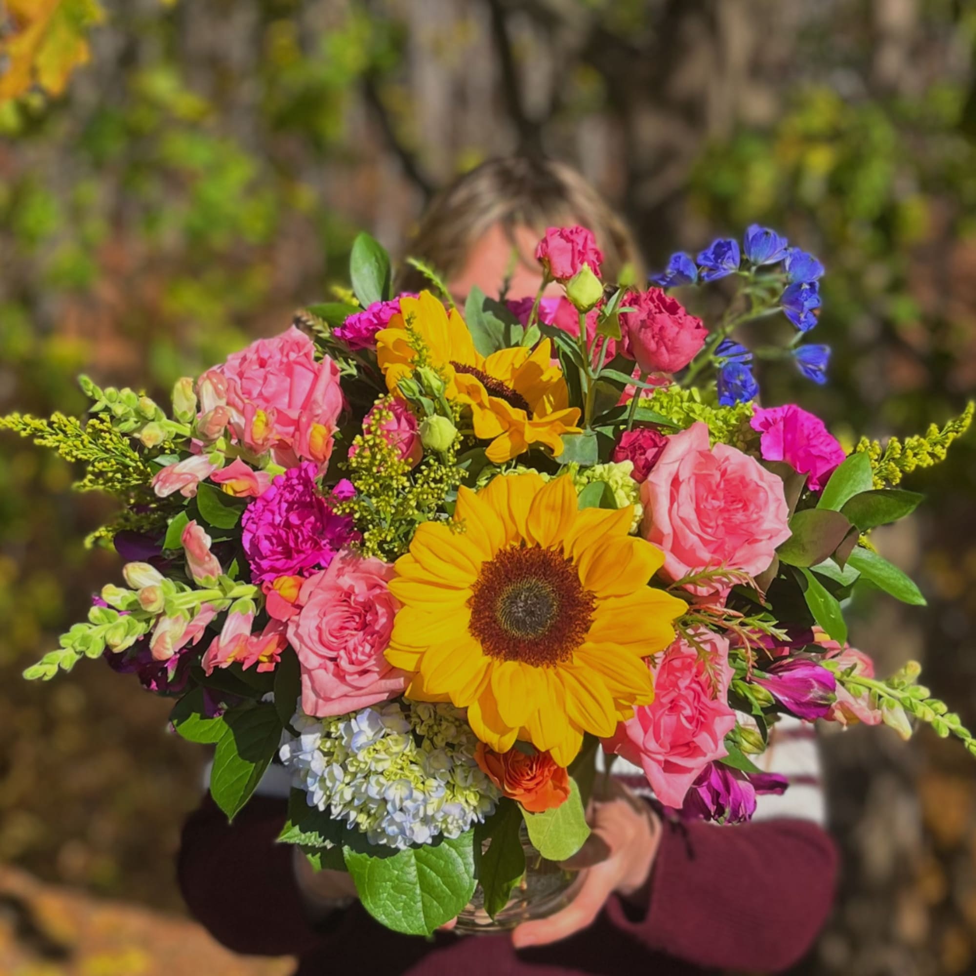 Bright Fall is a low and lush bouquet artfully designed in a