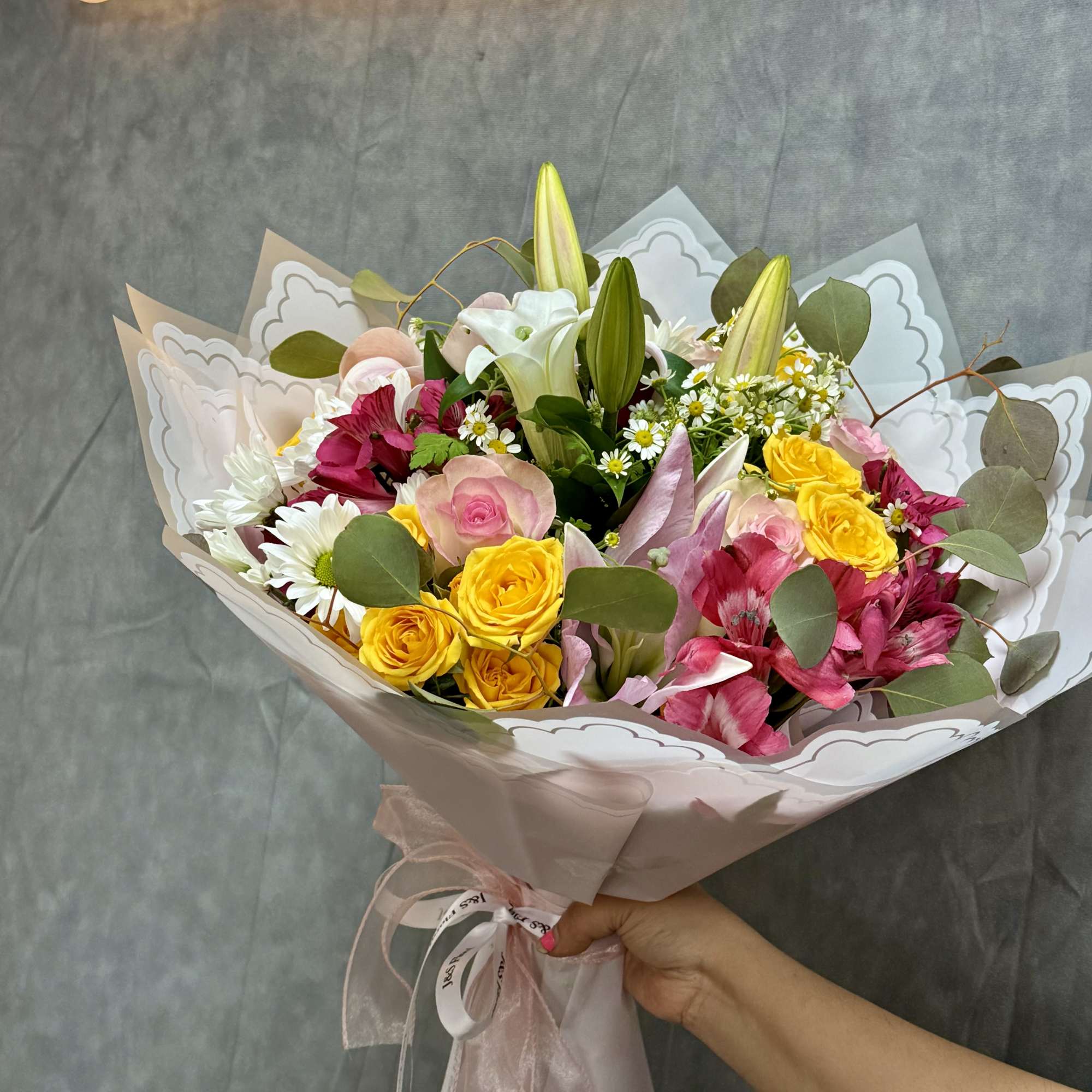 Beauty Mist Bouquet is a dreamy and elegant arrangement that exudes softness