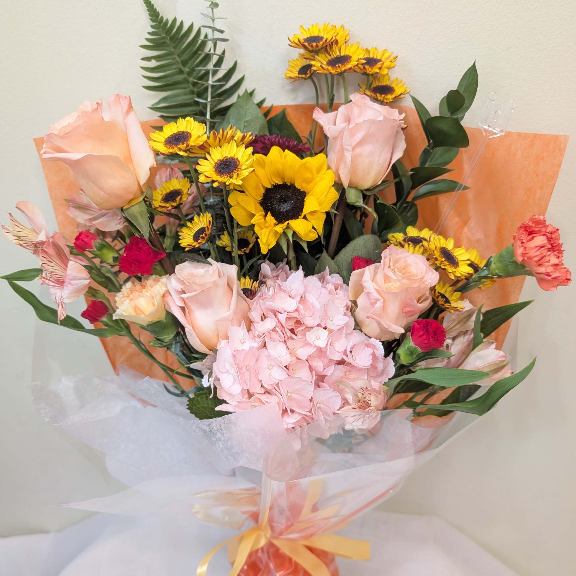Let our talented florists create something truly special for you.
This hand-tied bouquet