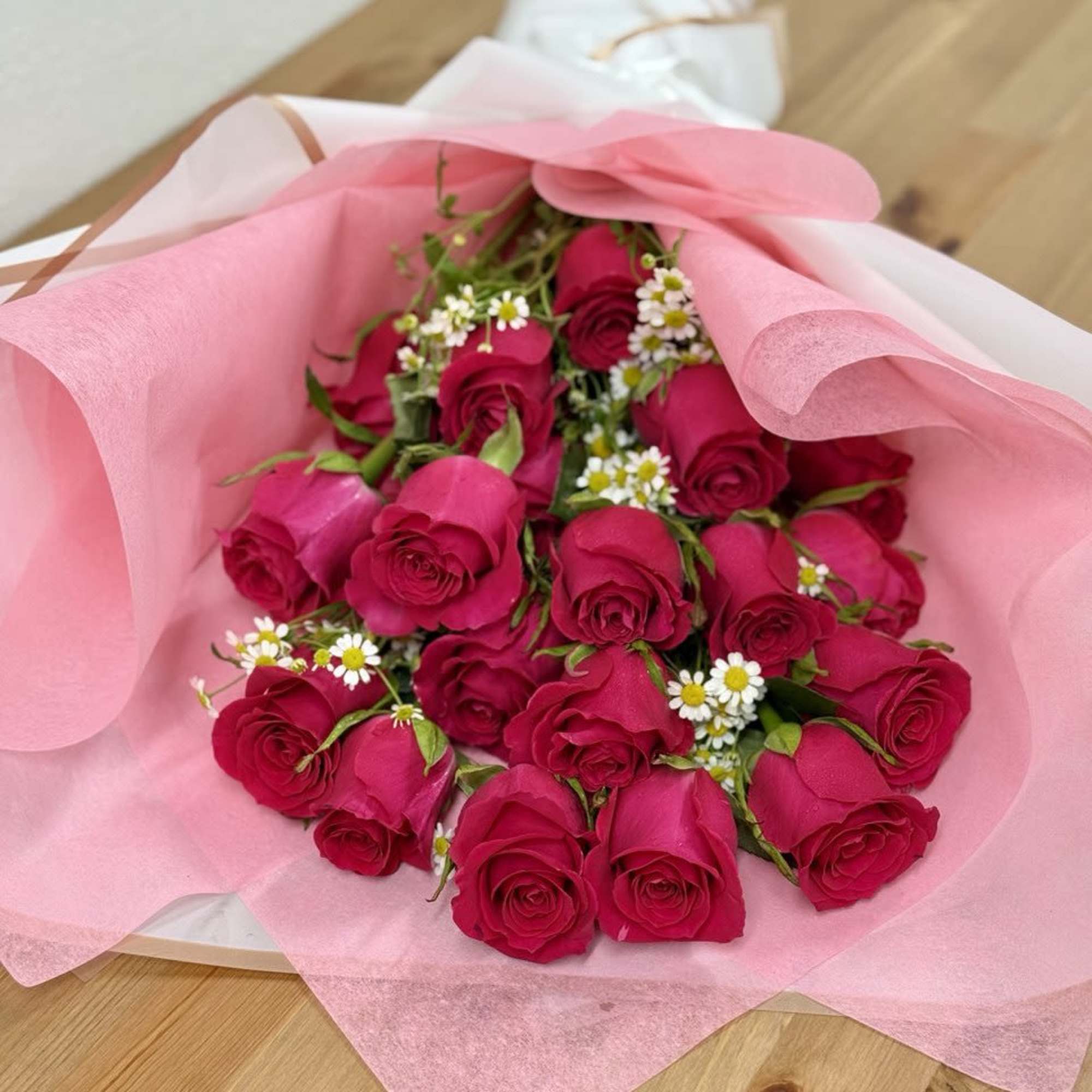 Unique bloom bouquet for all occasions with beautiful hot pink roses.