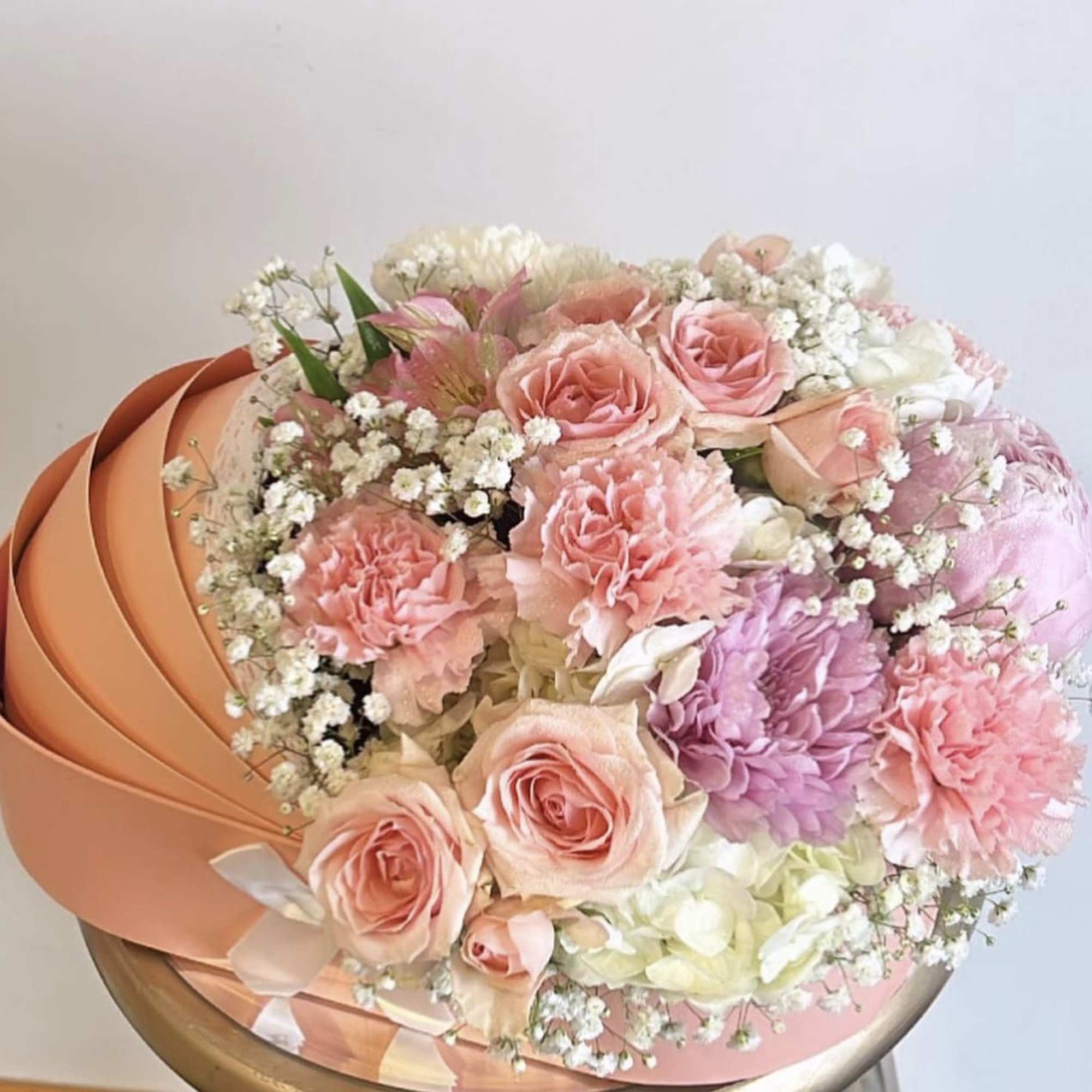 Flowers will vary, with the same overall theme. Also available for a