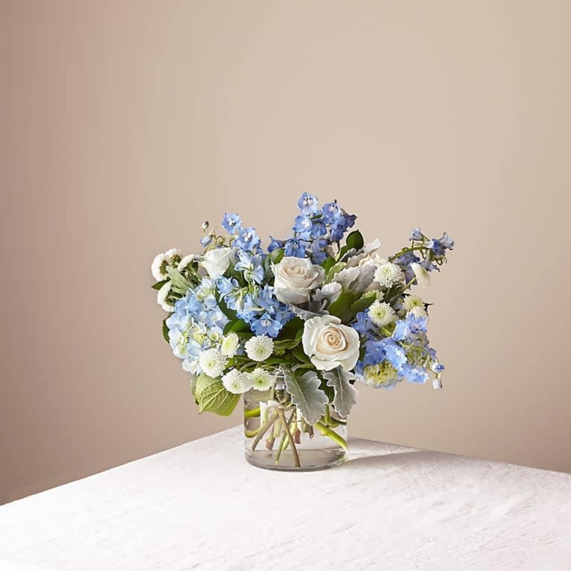 CLEAR SKIES BOUQUET

Let this uplifting arrangement be reminders of the clear skies