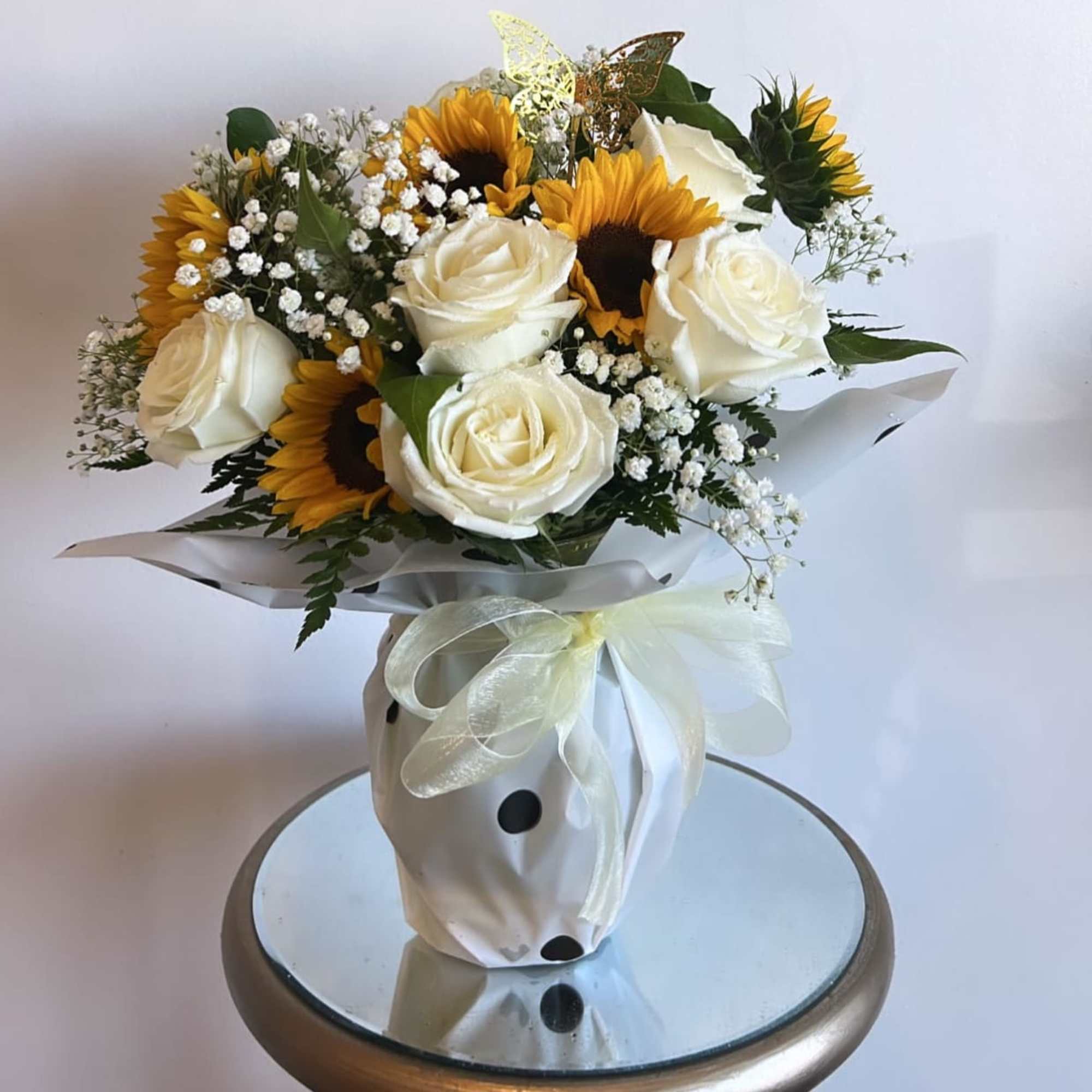 Sunflowers &amp; Roses Arrangment 

Vase may be wapped in a different paper