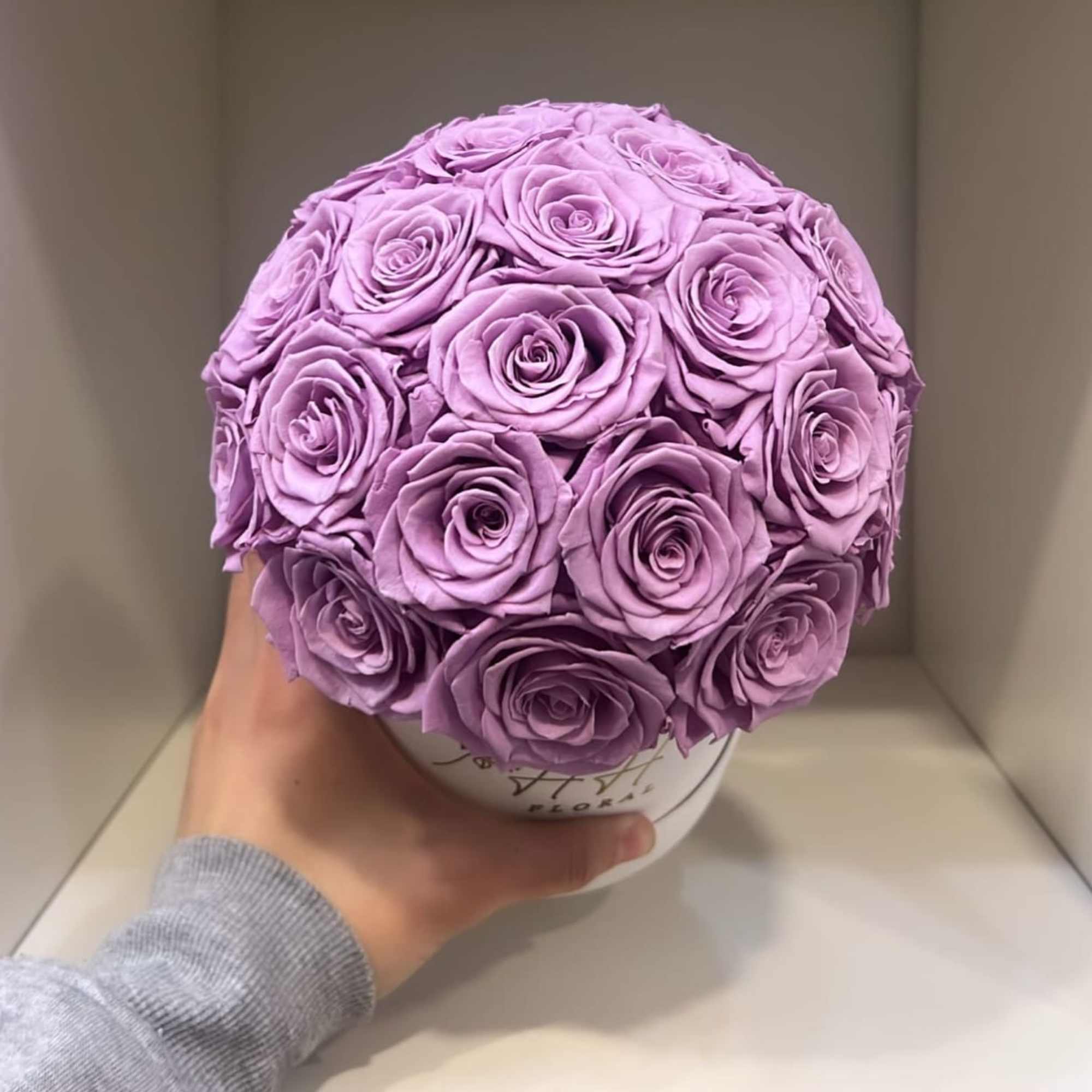 If you seek a positive long-lasting impression, then this preserved flower assortment