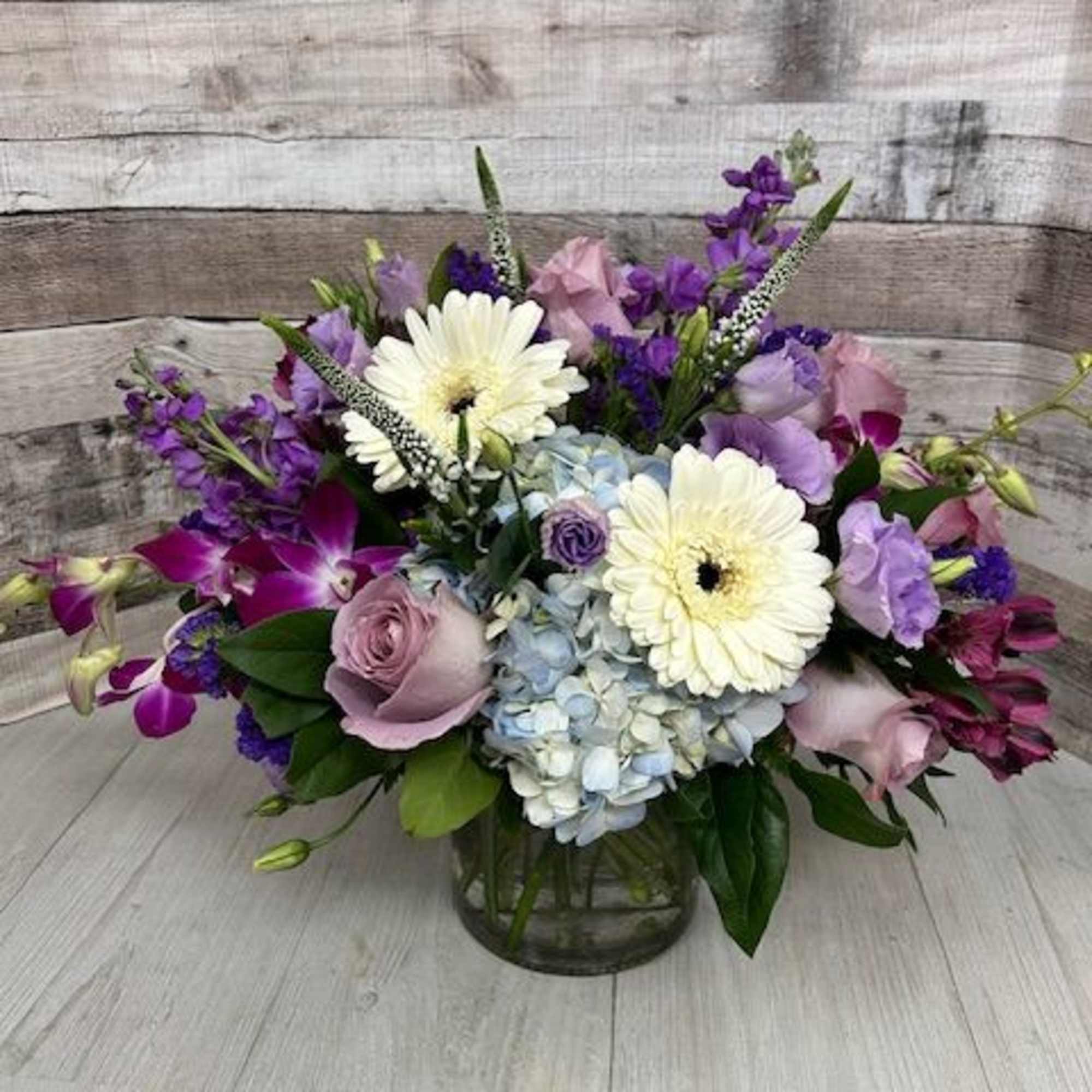 The Lavender Horizon Bouquet captures the tranquil beauty of dusk, where soft