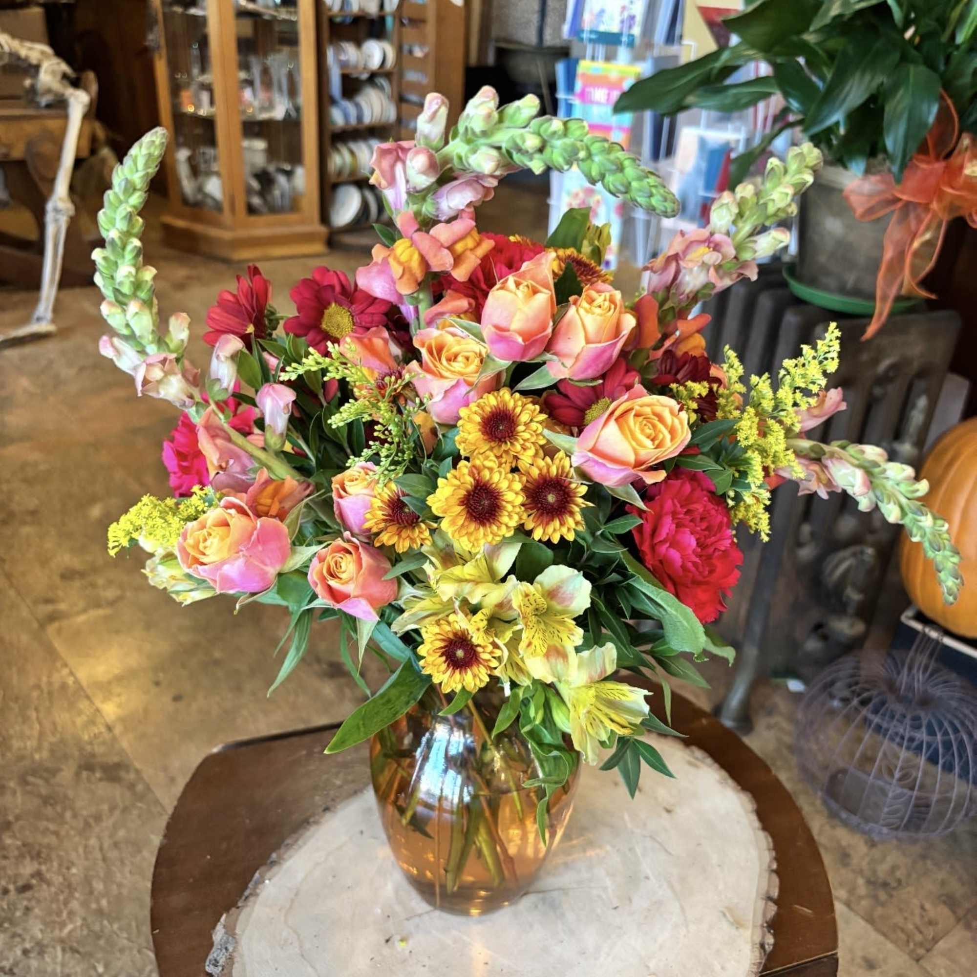 Give a warm welcome with this cheerful blend of autumn tones. Orange